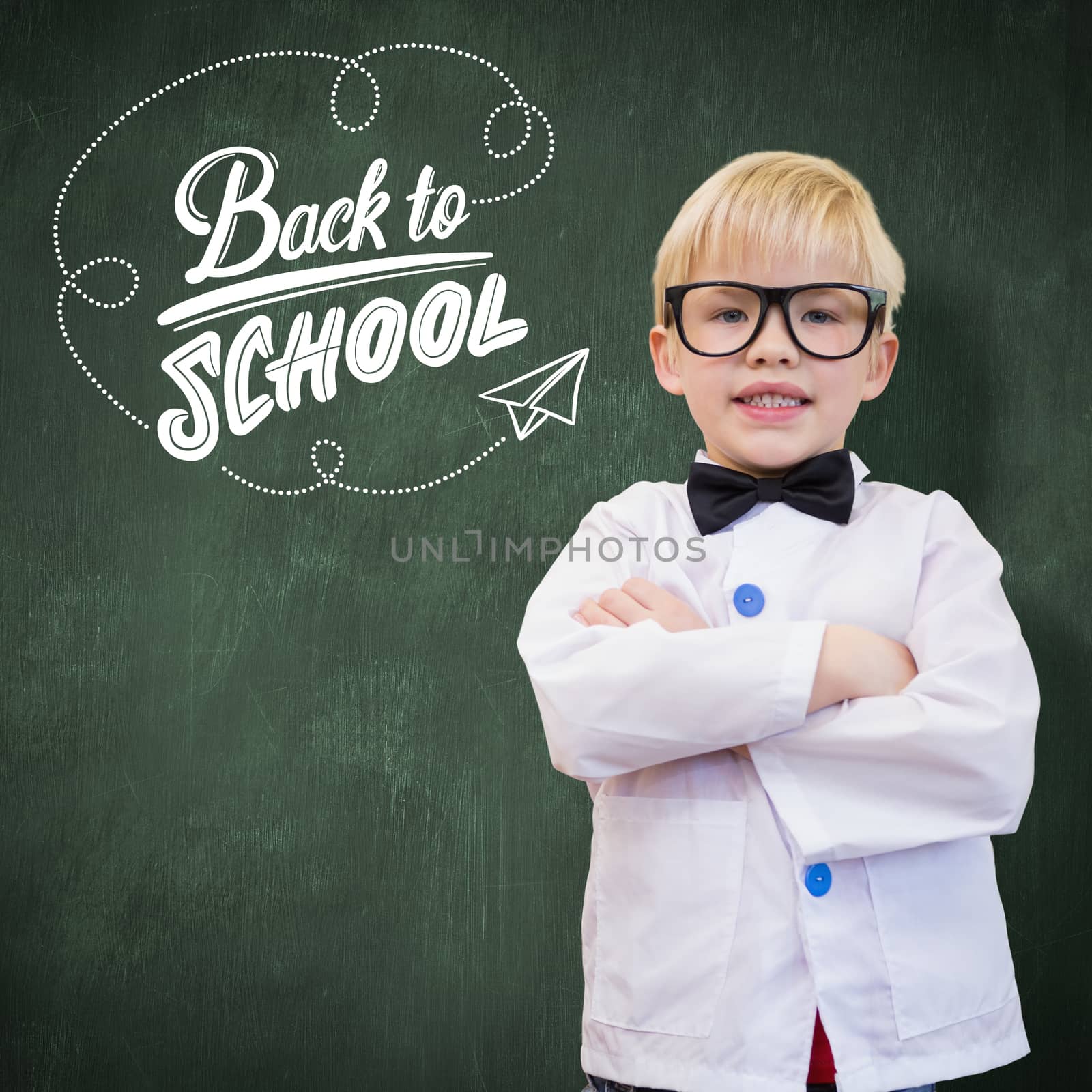 Cute pupil dressed up as teacher against green chalkboard
