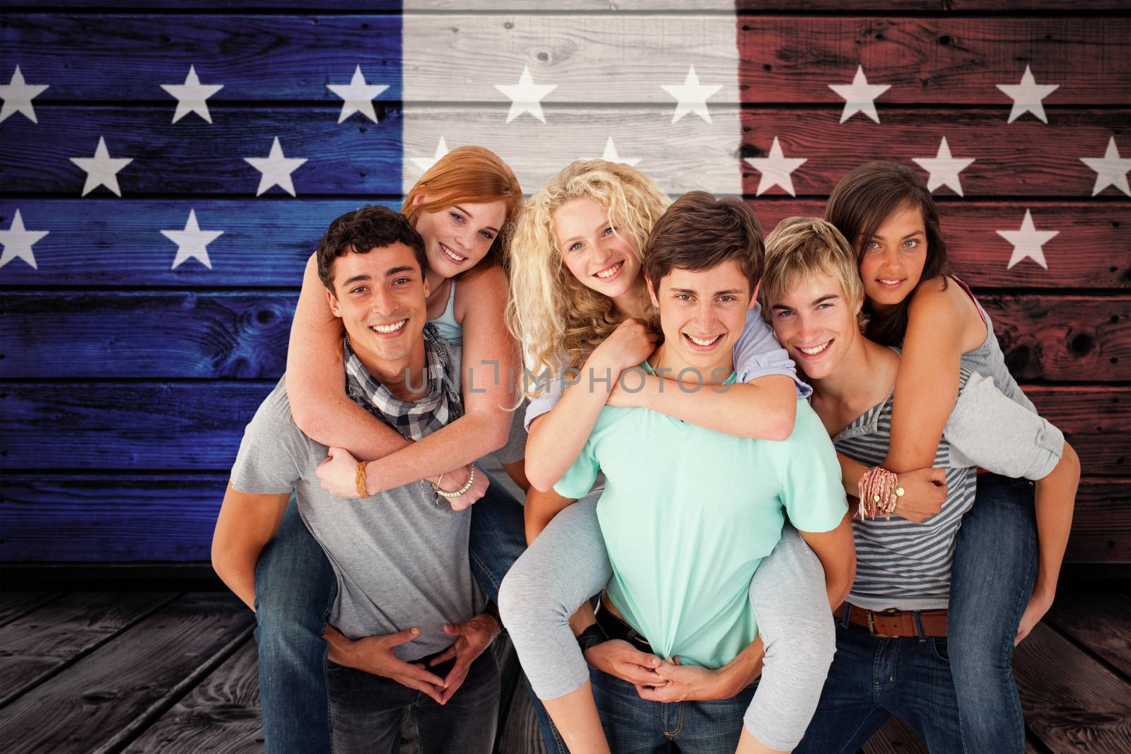 Composite image of teenagers giving their friends piggyback rides by Wavebreakmedia