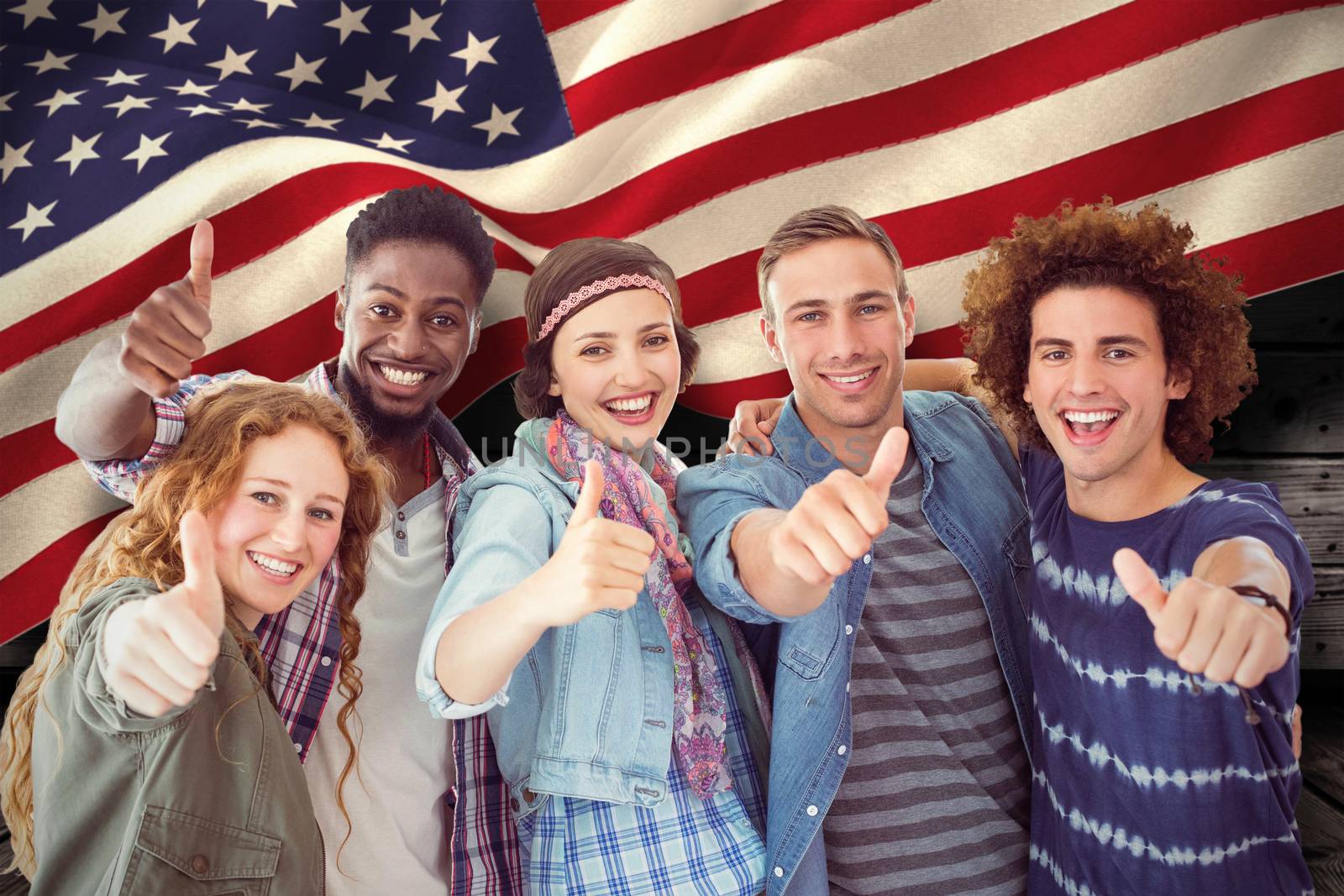 Fashion students smiling at camera together against composite image of digitally generated united states national flag