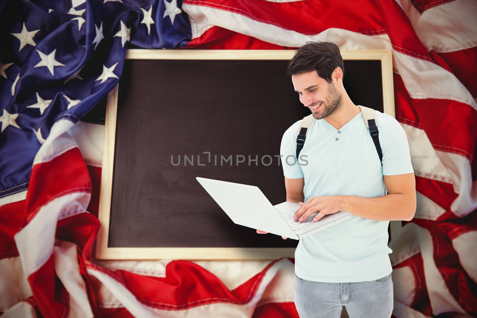 Composite image of student using laptop by Wavebreakmedia
