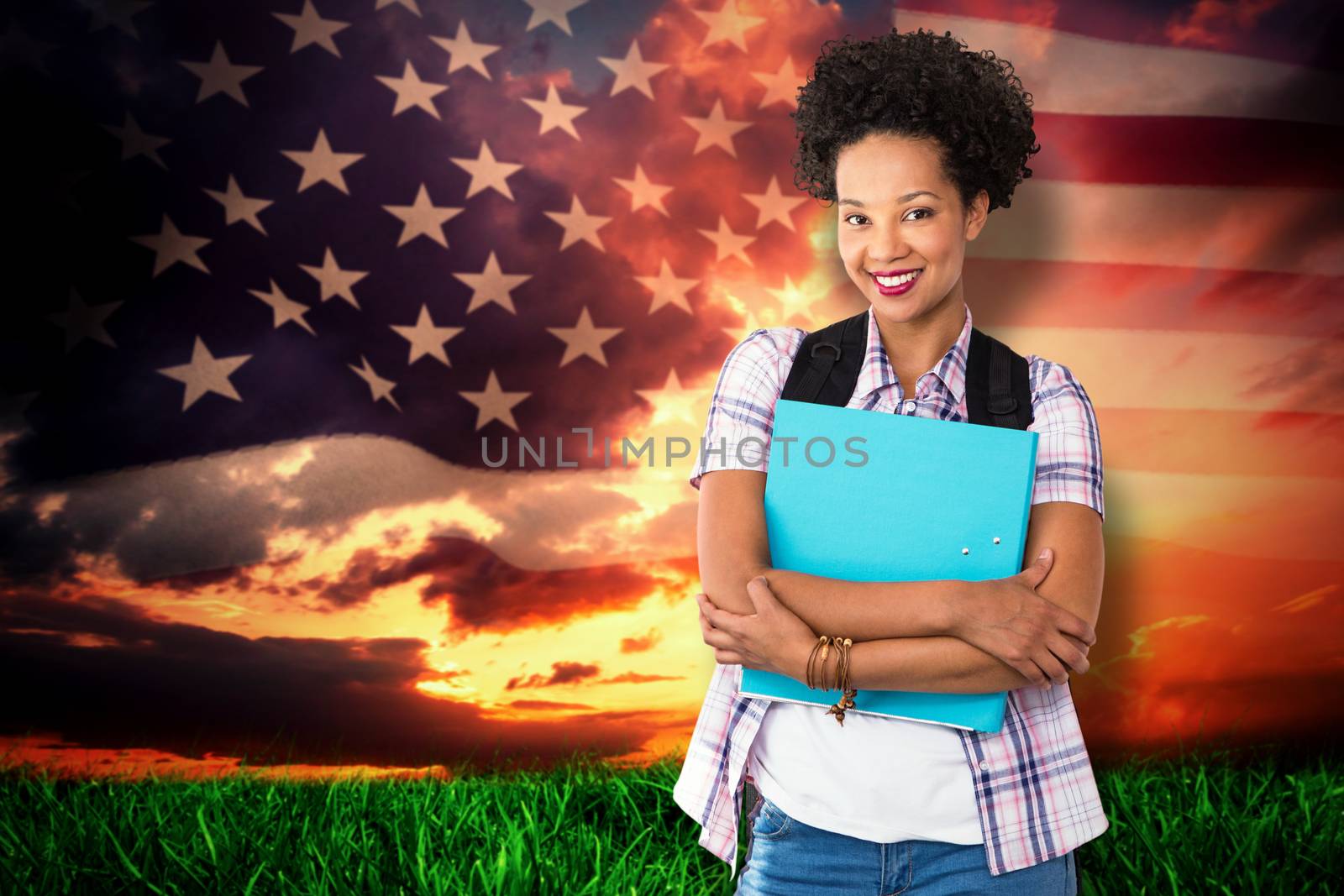 Casual young woman with folder in office against composite image of united states of america flag