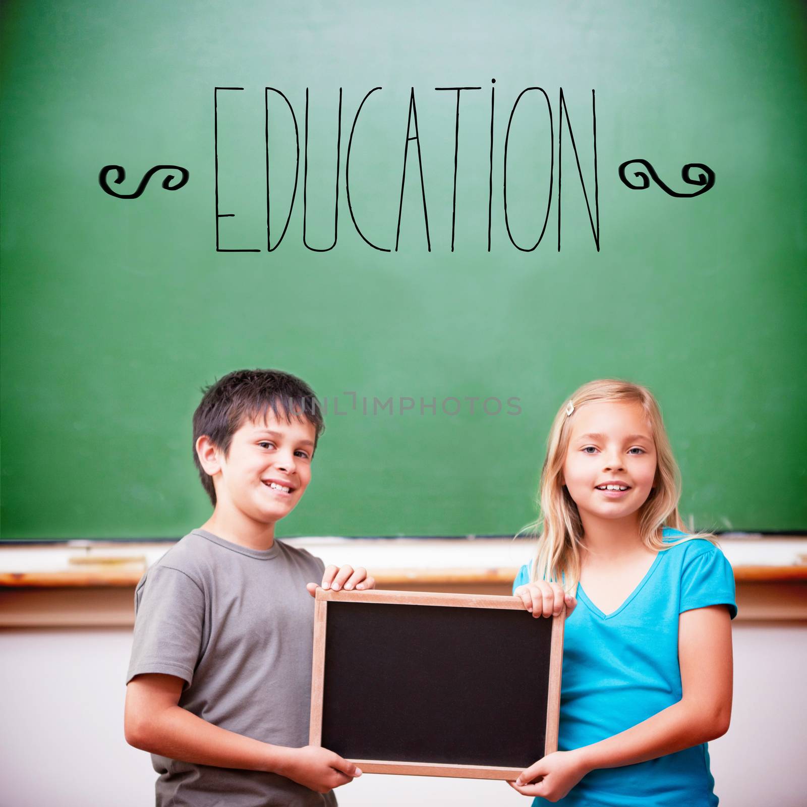The word education against cute pupils showing chalkboard