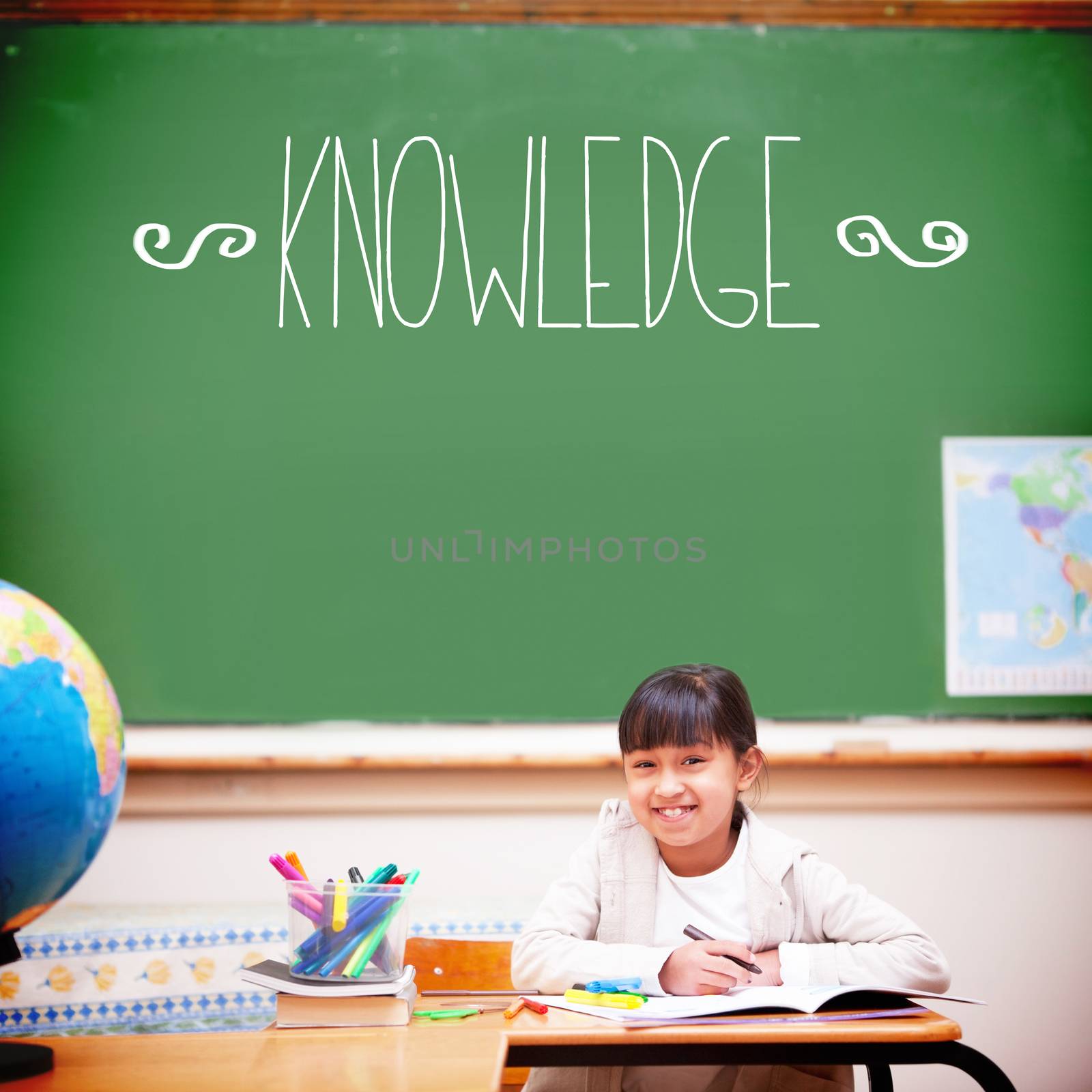 Knowledge against cute pupil sitting at desk by Wavebreakmedia