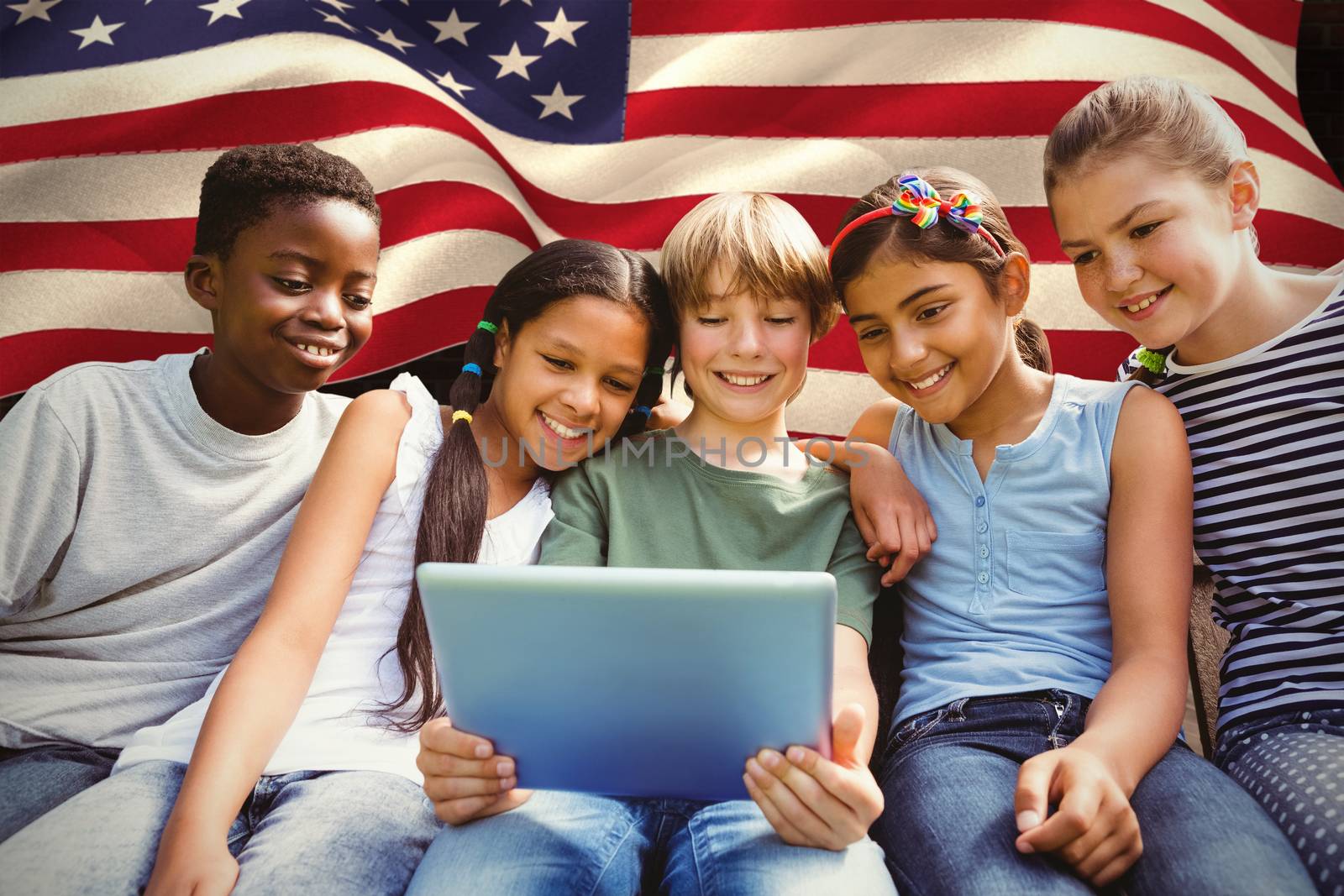 Happy children using digital tablet at park against composite image of digitally generated united states national flag