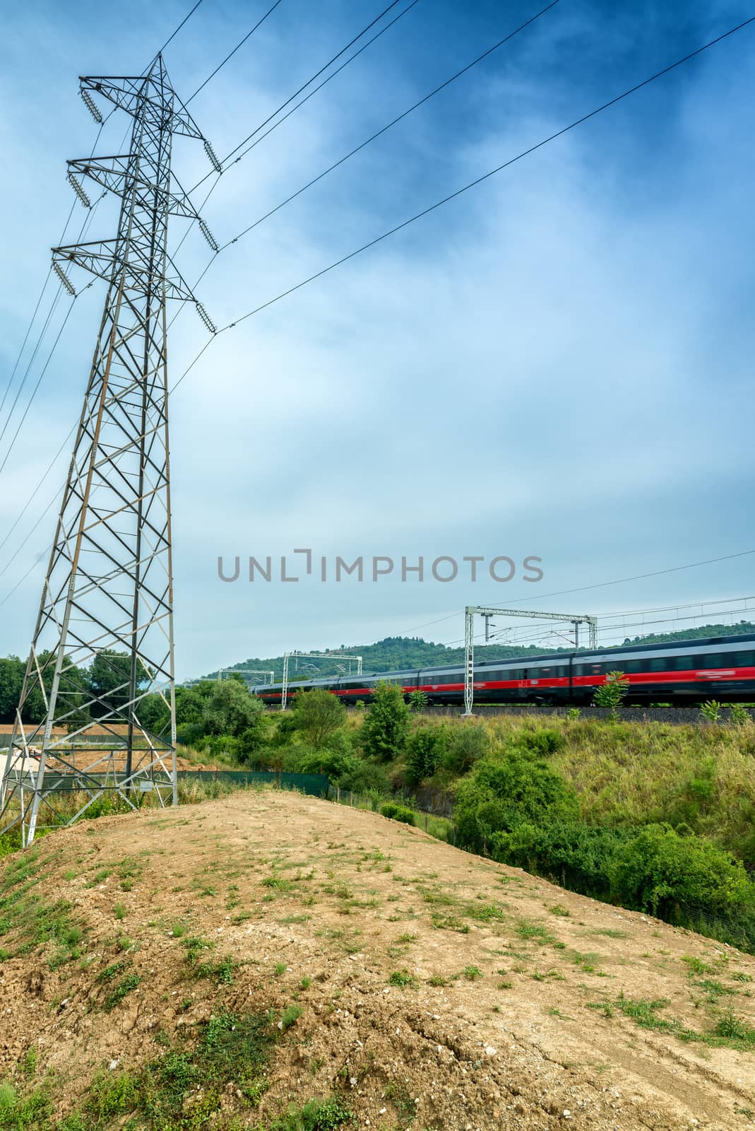 High speed train near industrial site by jovannig