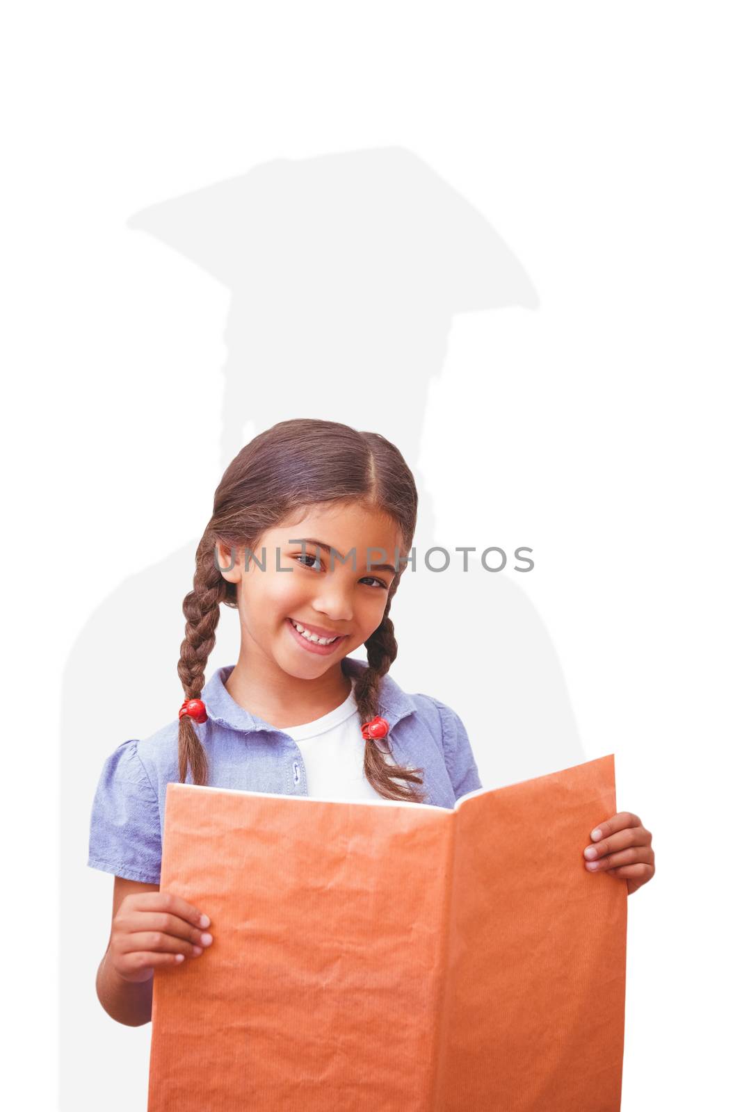 Composite image of cute pupil smiling at camera during class presentation by Wavebreakmedia