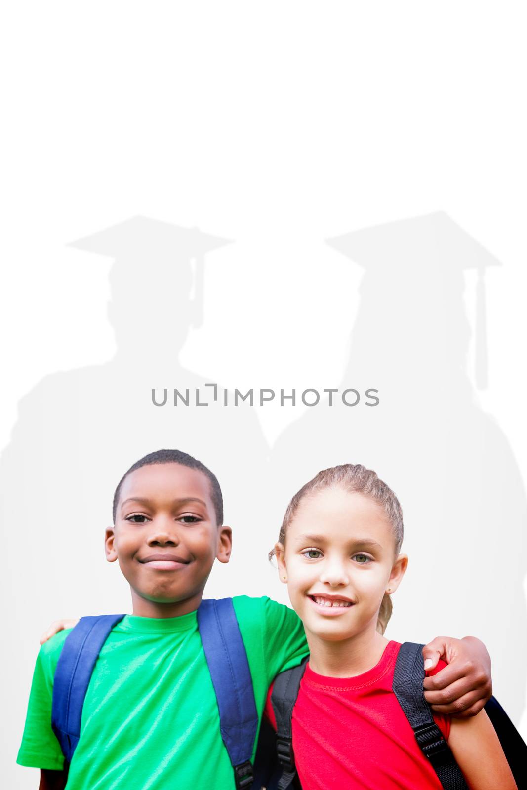 Cute pupils smiling at camera  against silhouette of graduate