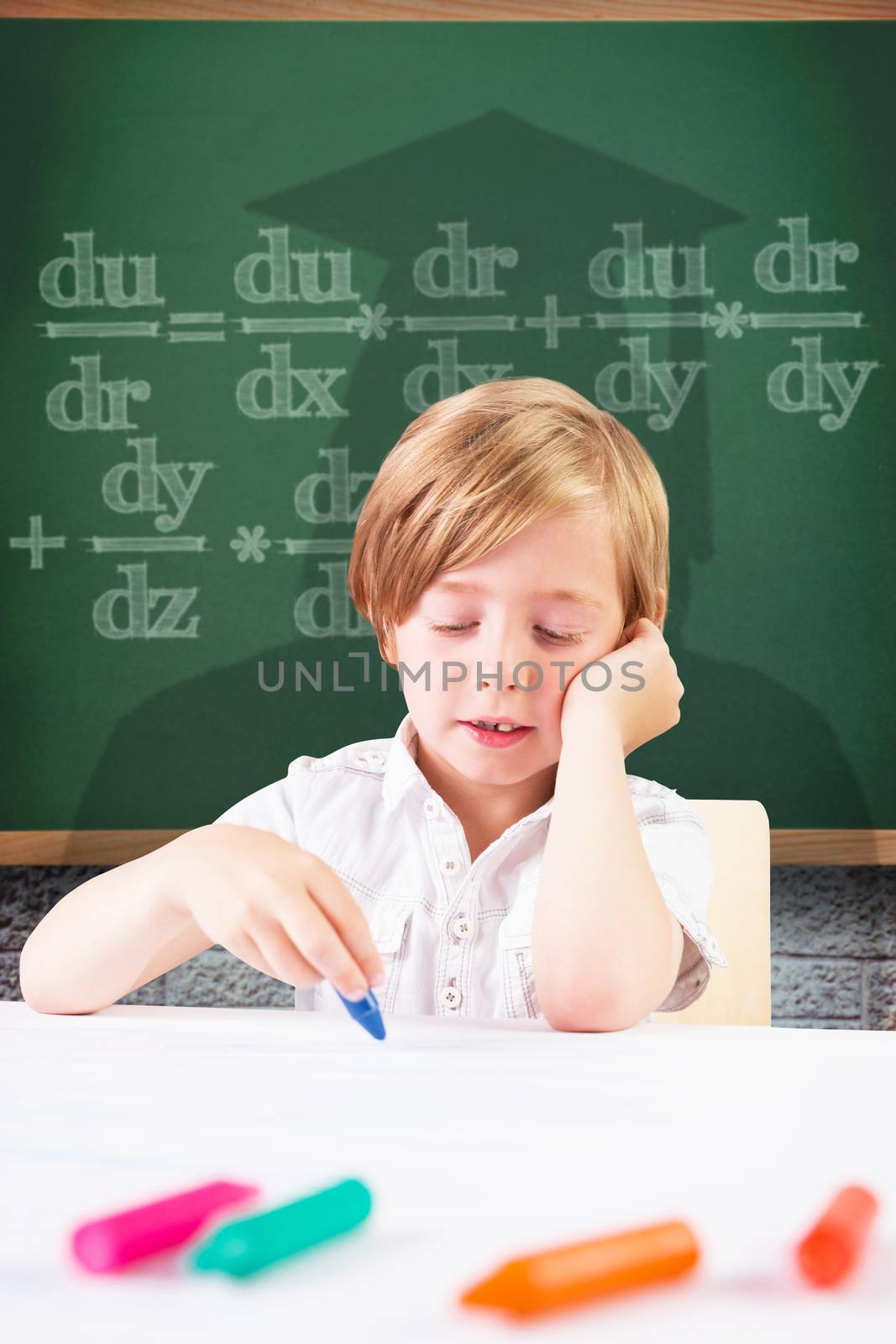 Composite image of cute boy colouring by Wavebreakmedia