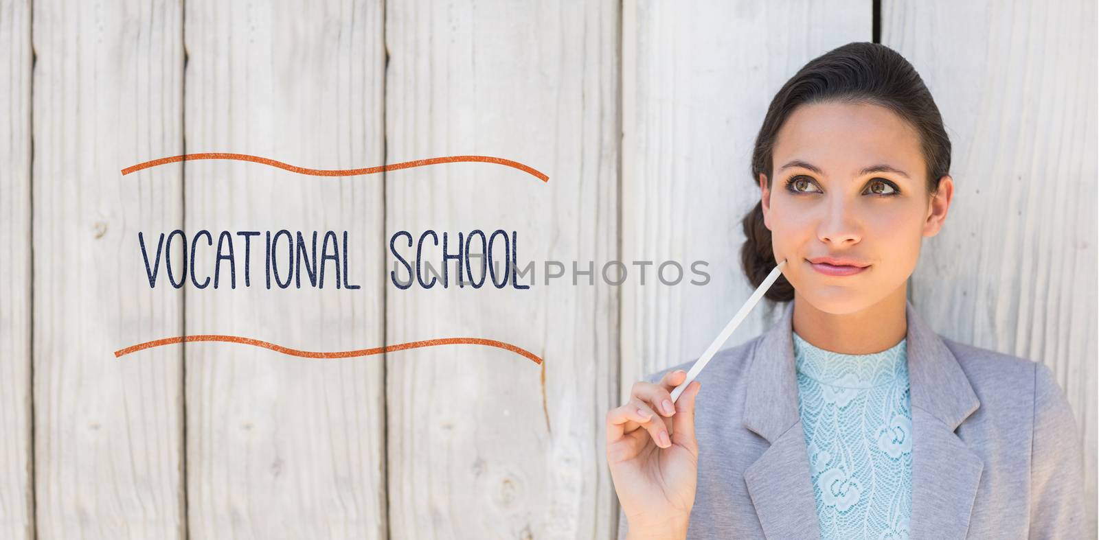 The word vocational school against stylish brunette thinking and smiling