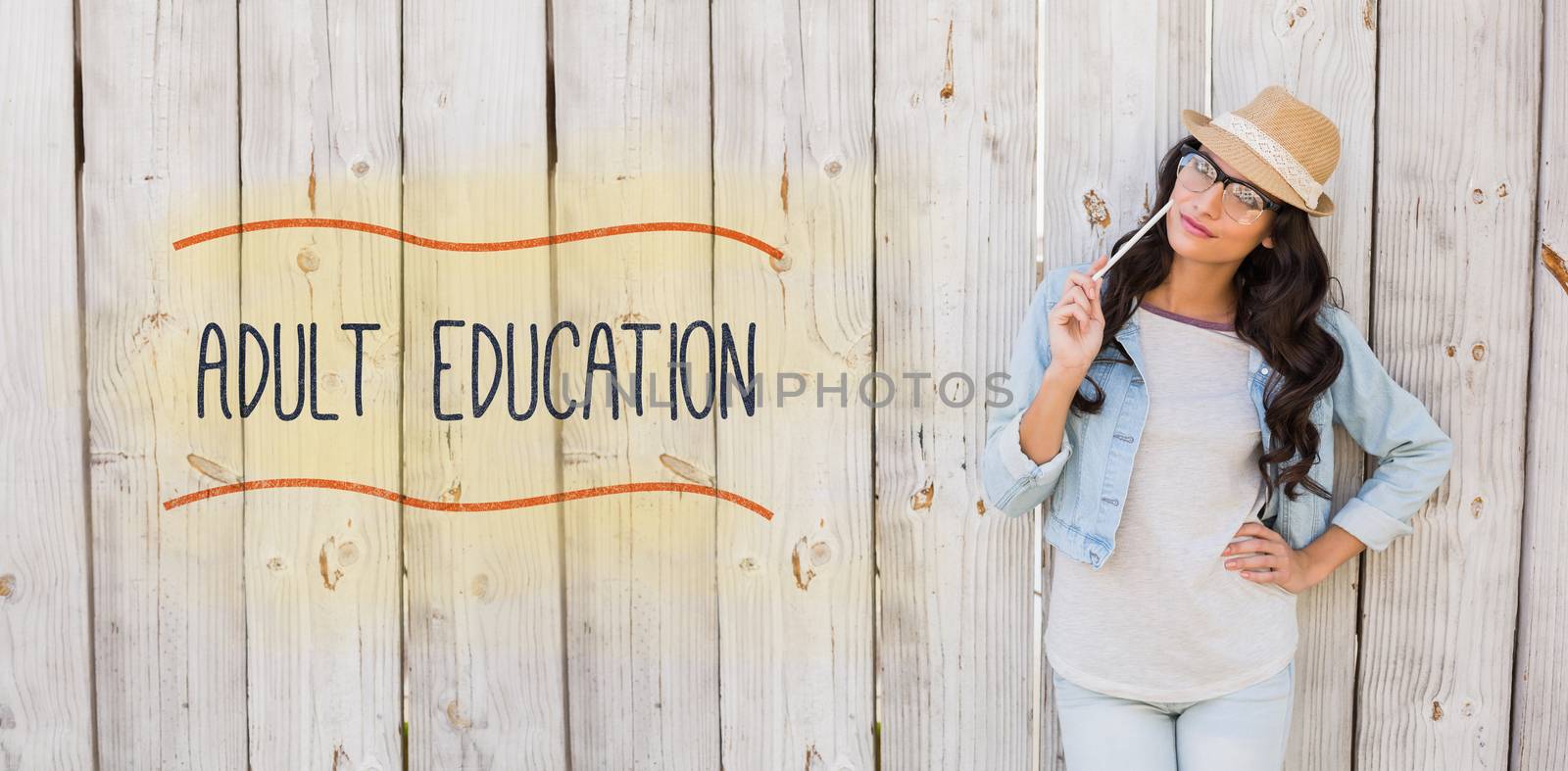 The word adult education against pretty brunette thinking and smiling