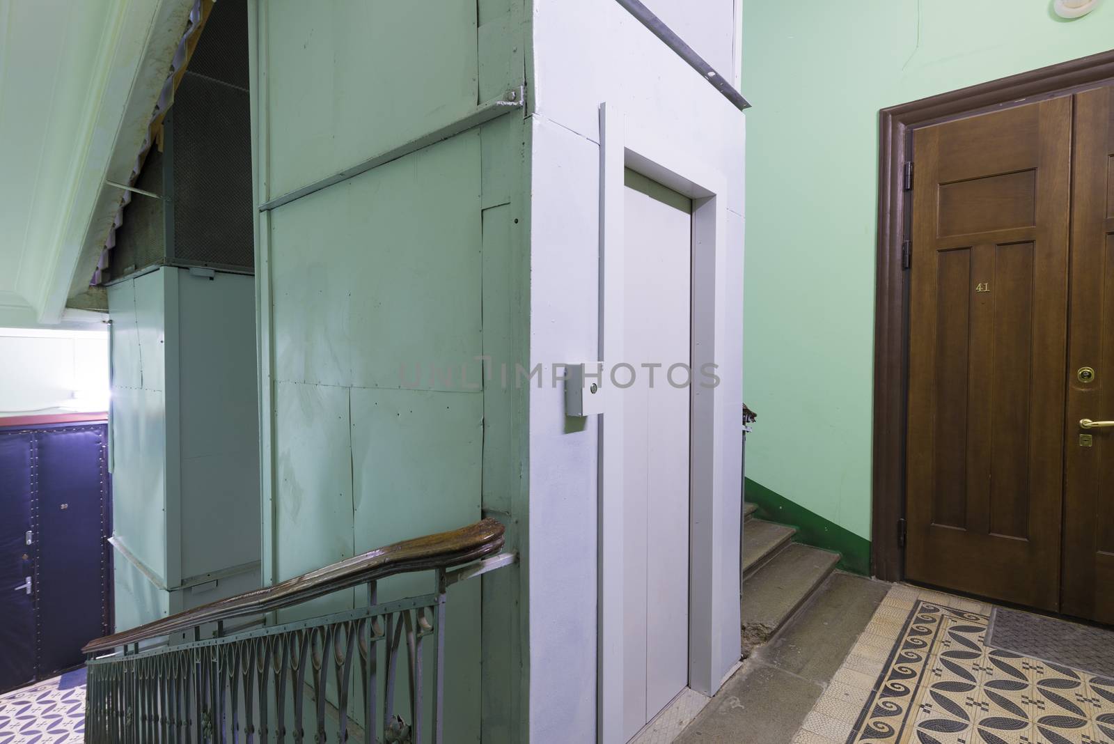 entrance of a residential building with an elevator