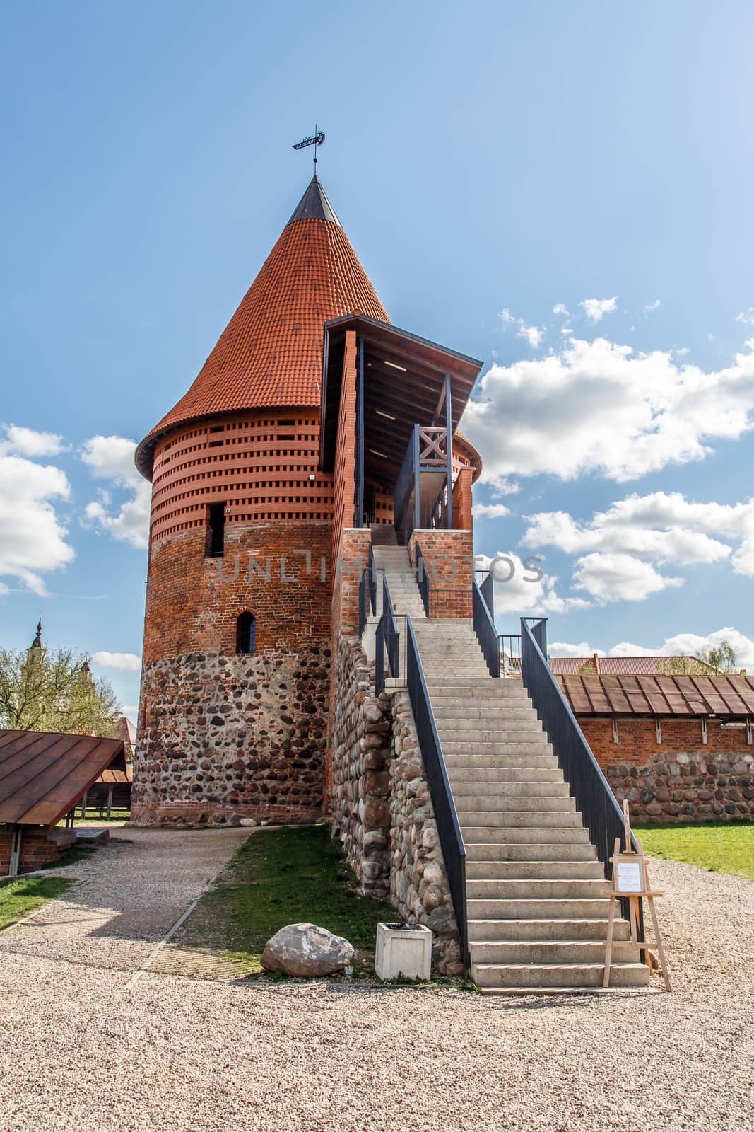 Close up view of historical gothic Kaunas Castle with stairs from medieval times in Kaunas, Lithuania, on cloudy sky background.