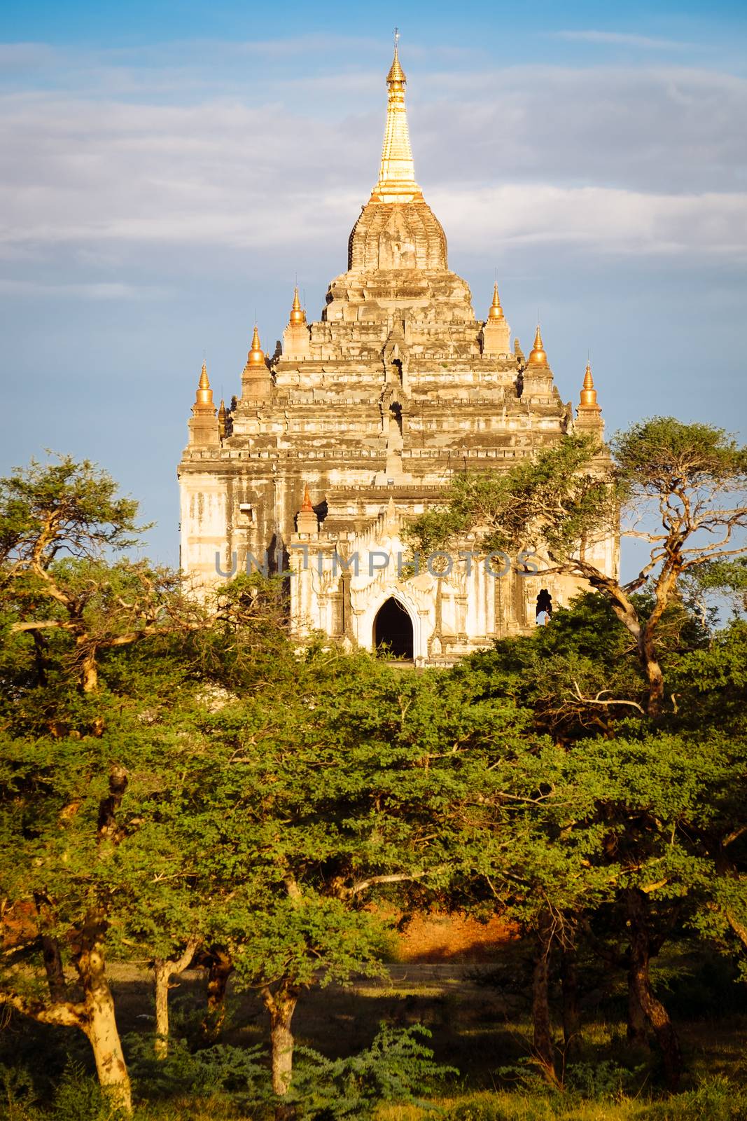 Scenic sunset view of beautiful ancient temple in Bagan, Myanmar by martinm303