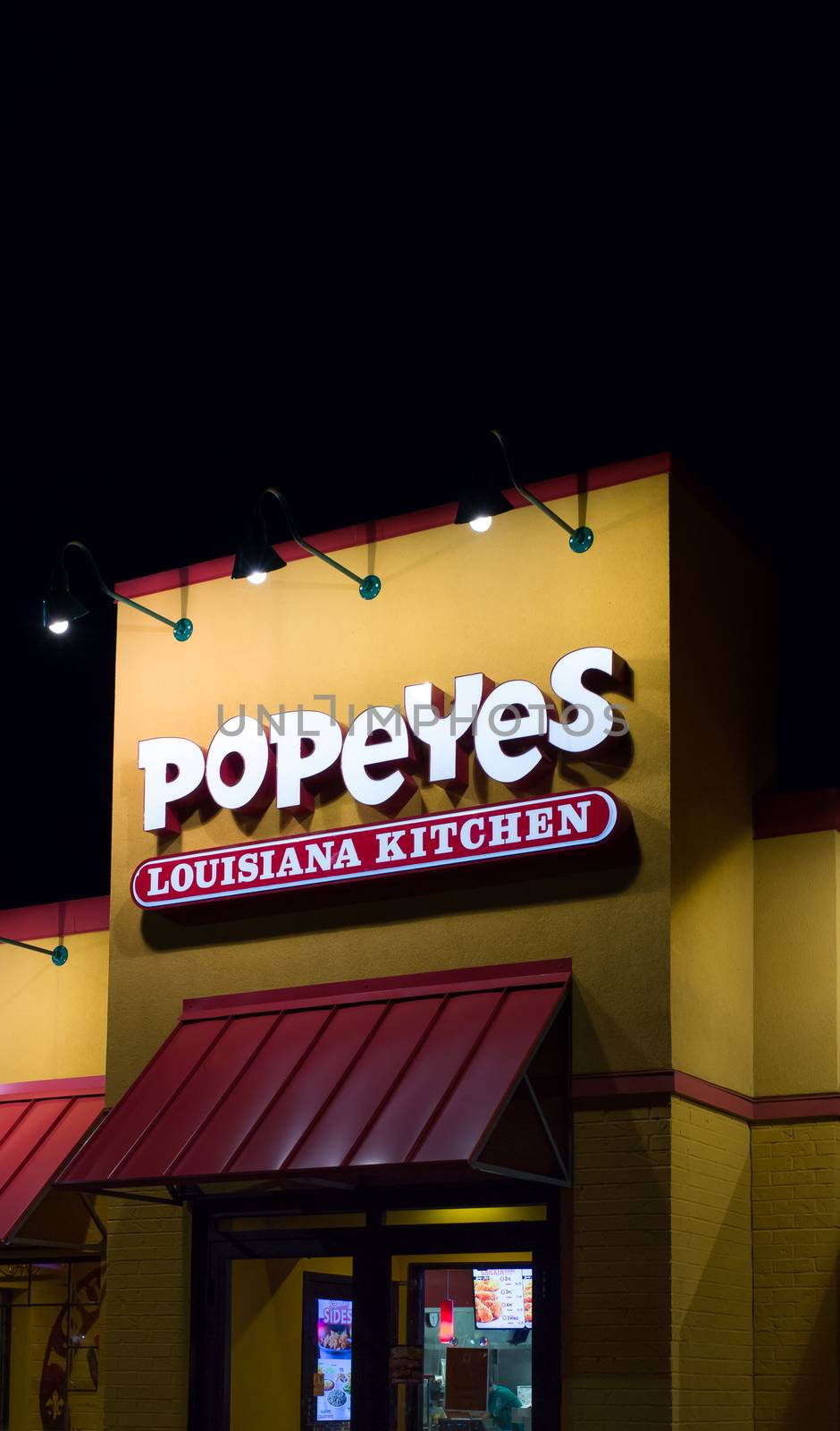 BLOOMINGTON, MN/USA - AUGUST 5, 2015: Popeyes Louisiana Kitchen exterior. Popeyes Louisiana Kitchen is an American chain of fried chicken fast food restaurants.