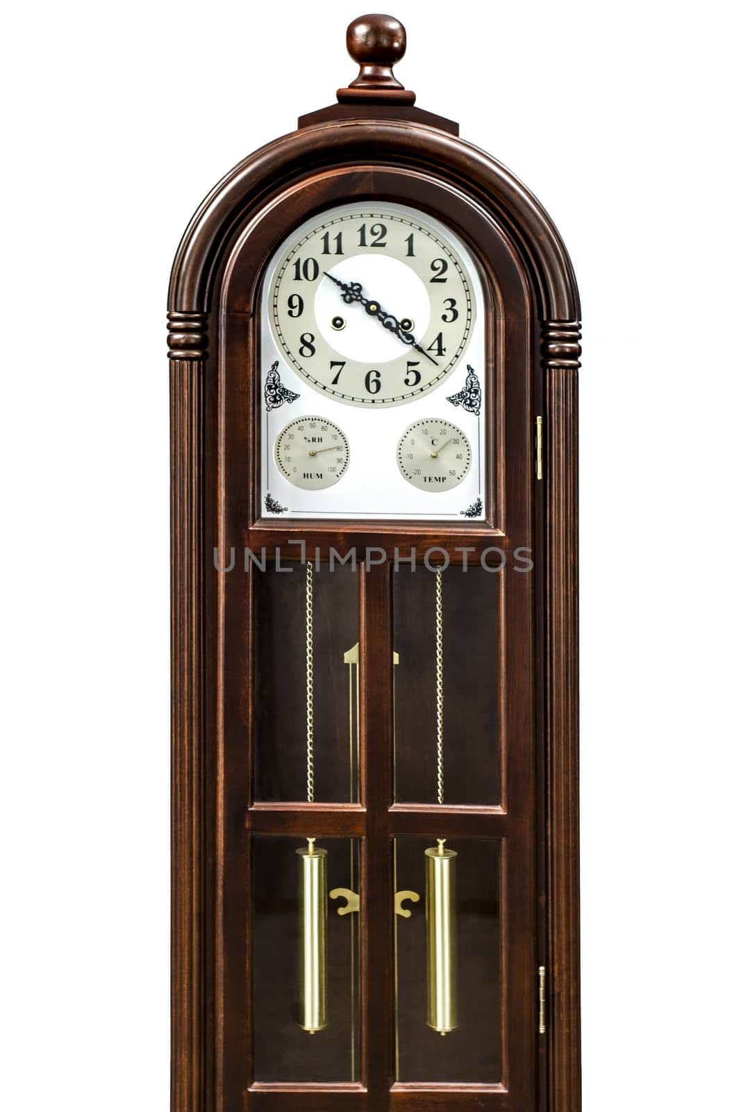 Antique clock with wood carved decoration, isolated on white background