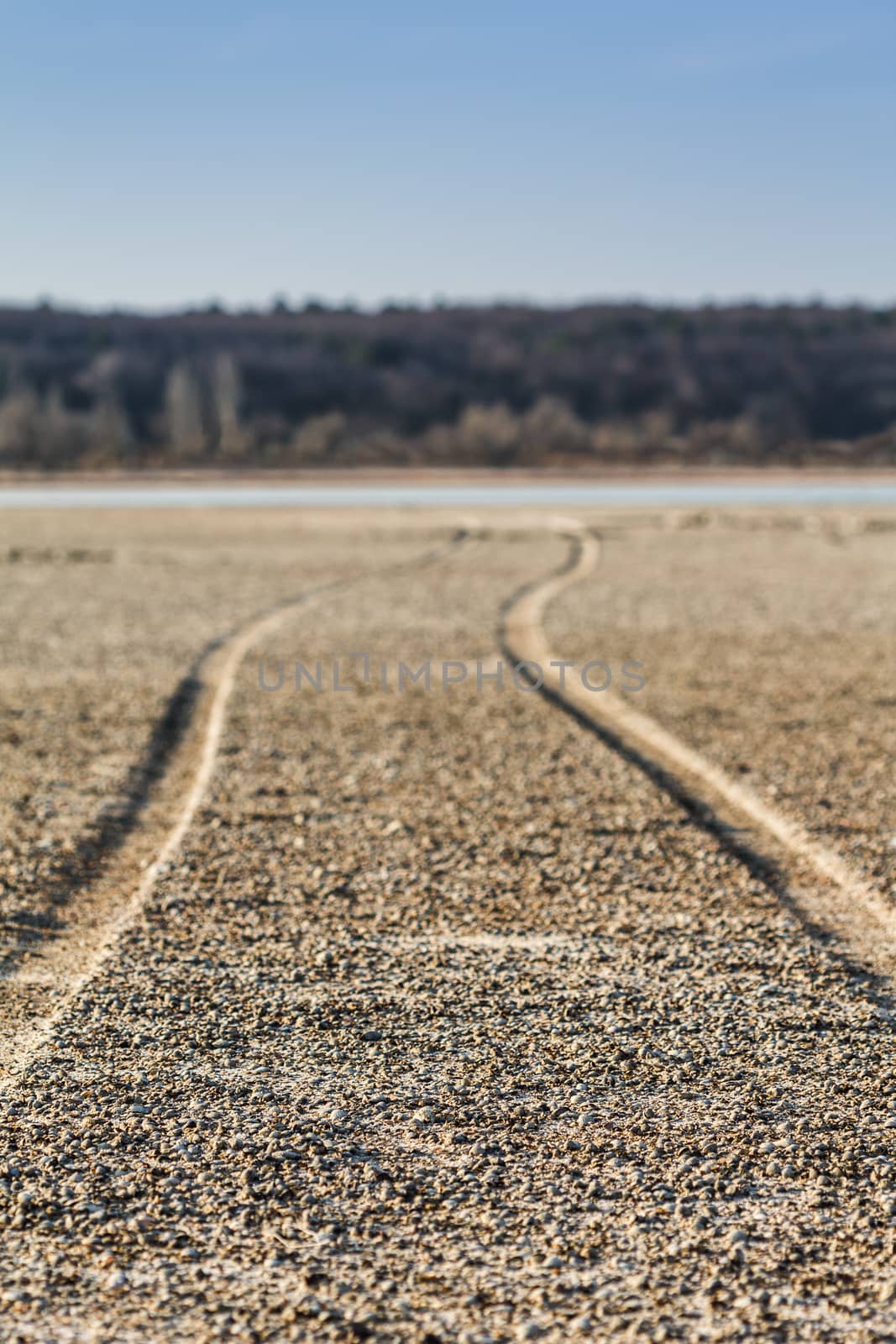 The road along the bottom of the dried lake, shallower depth of field
