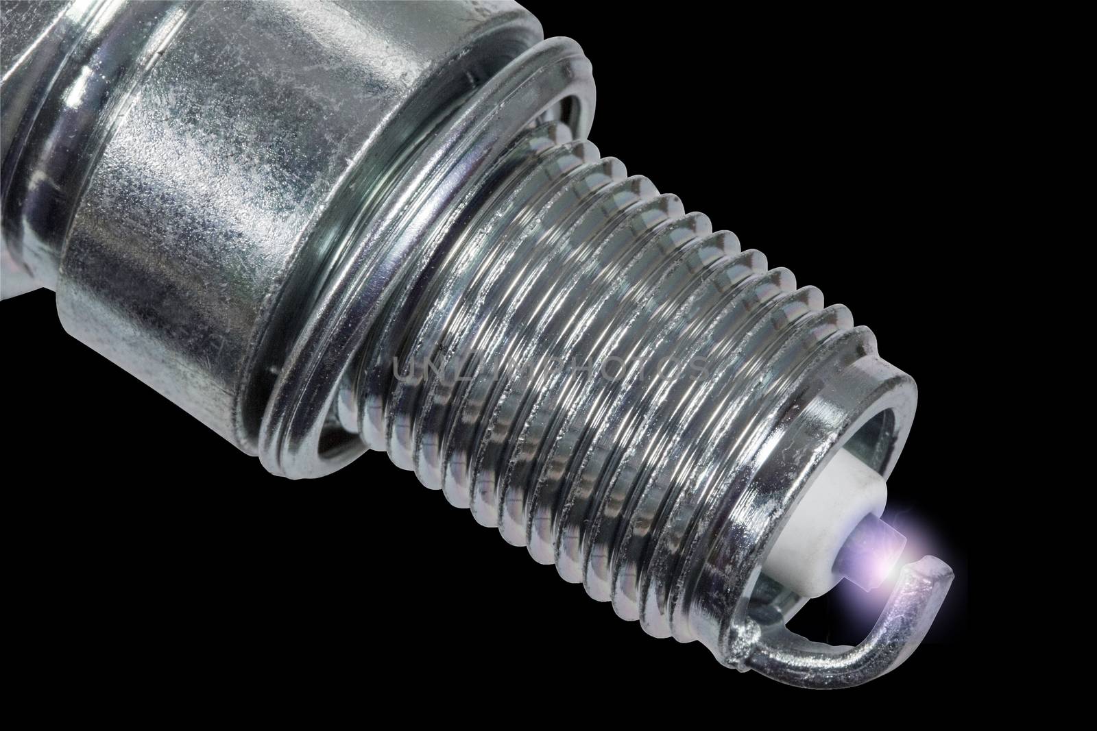 Spark plug, isolated on black background