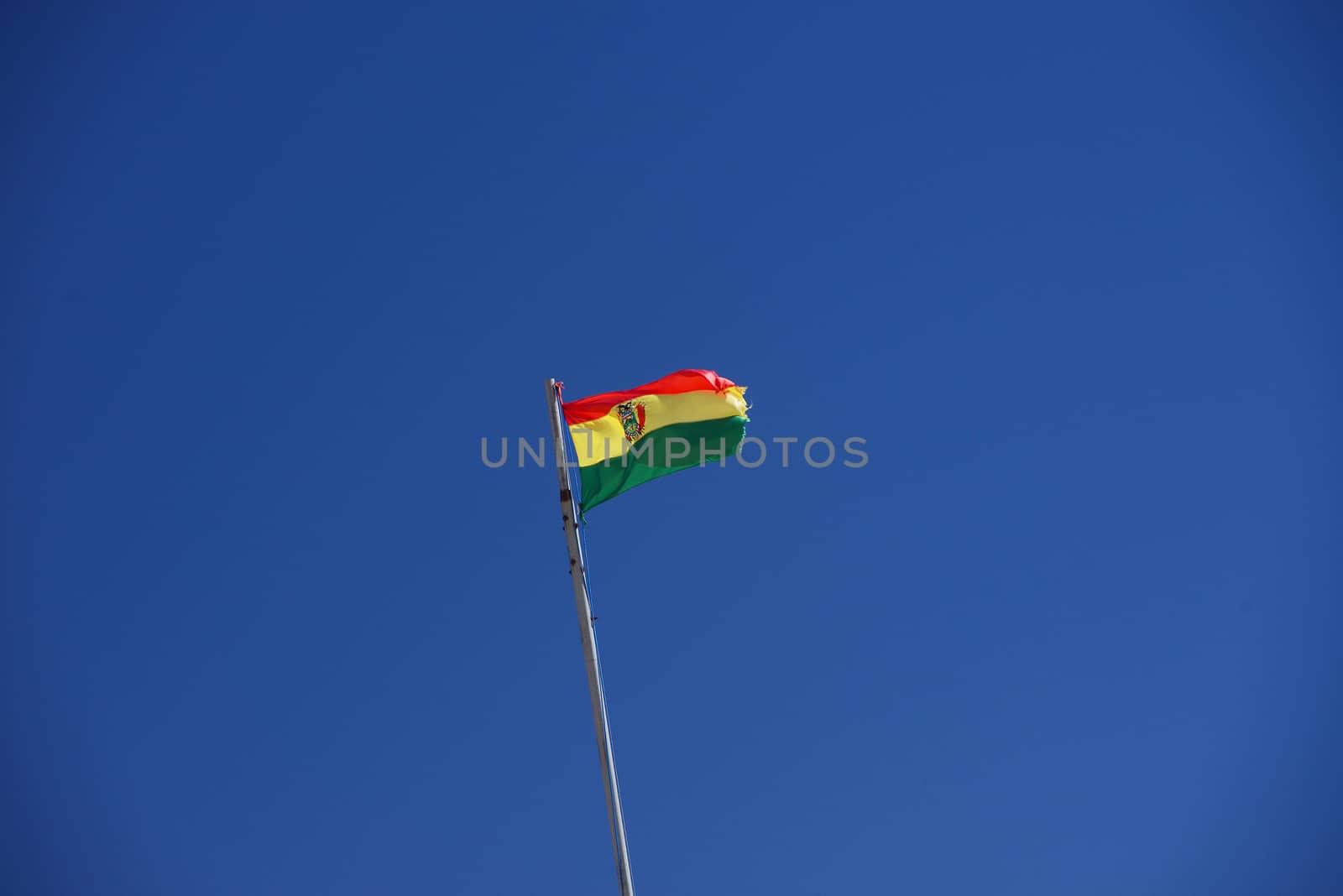 bolivia flag with a blue sky