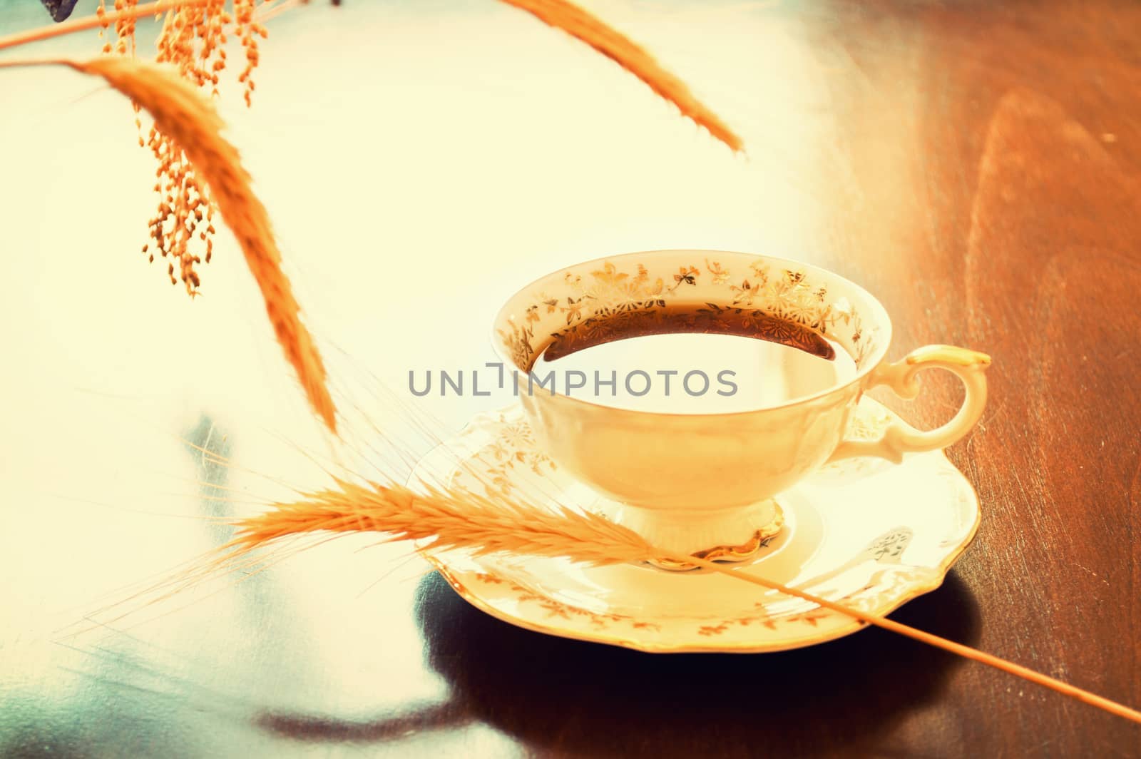 Antique porcelain cup of coffee on the table. Retro vintage instagram picture. Food and drink.