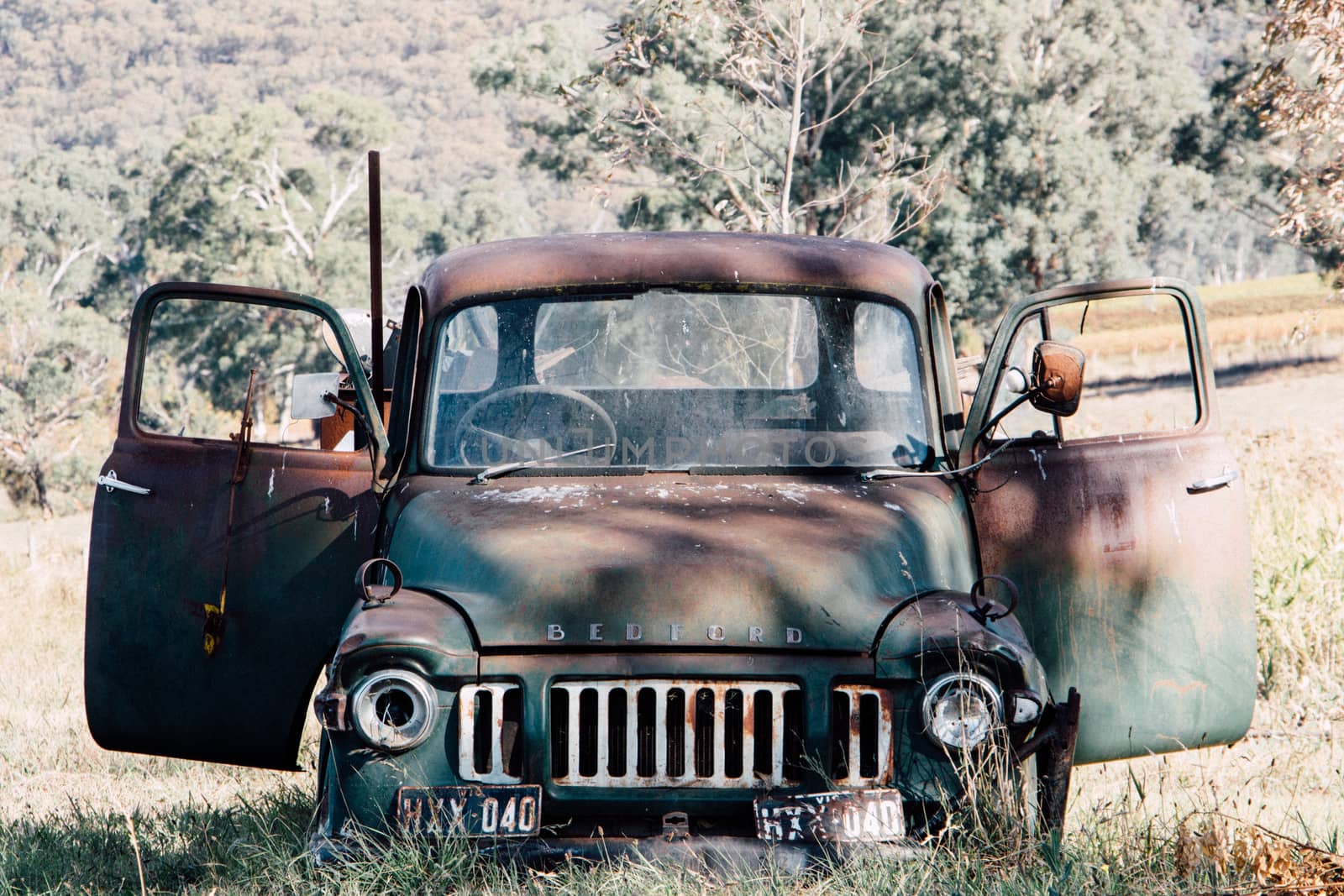 An old truck decaying and abandoned in the Australian bush.