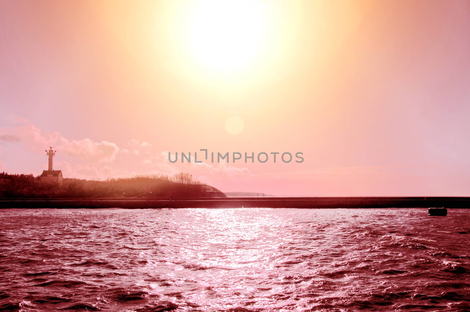 Summer conceptual image. Sun over sea and coast.