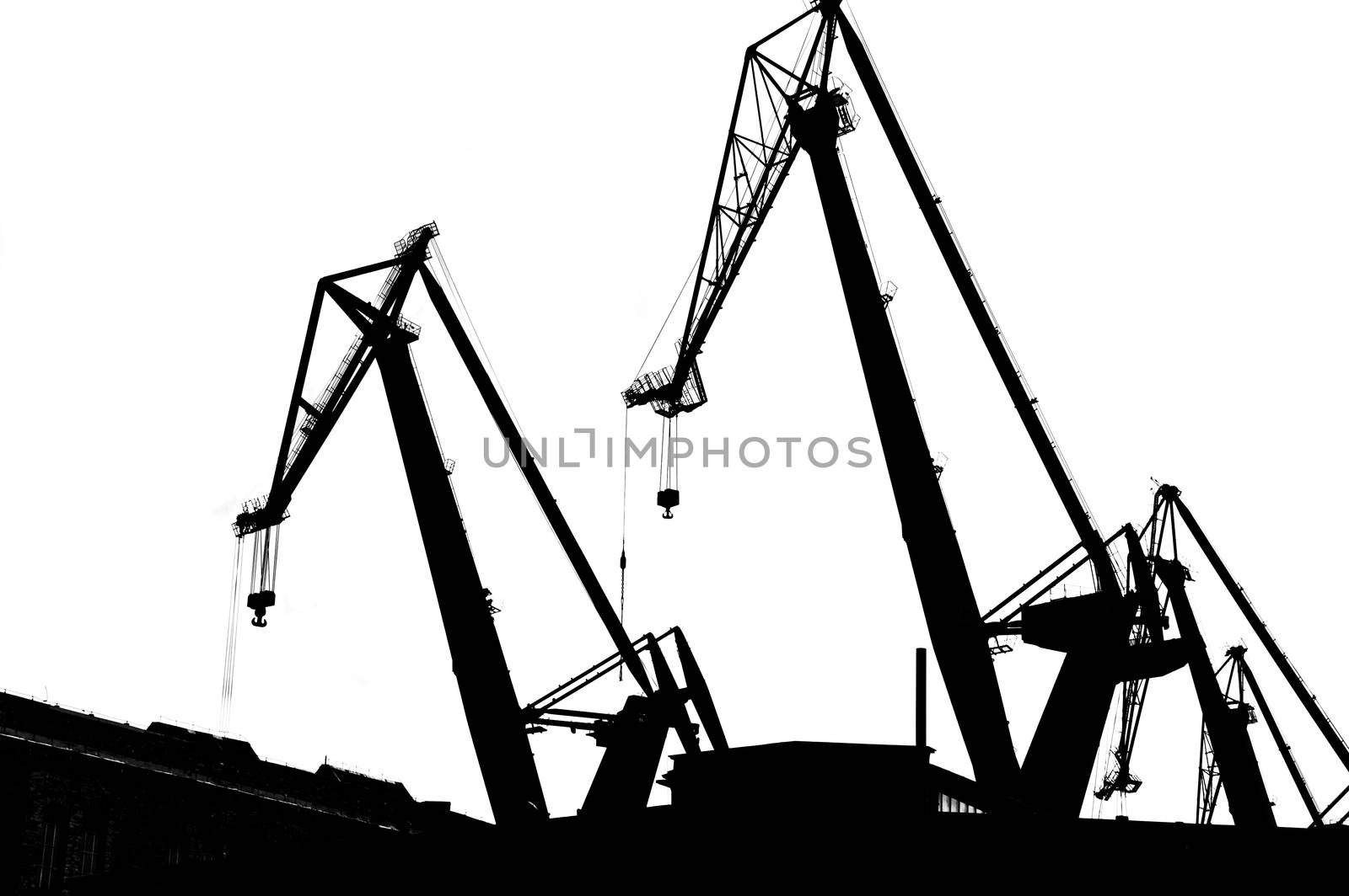 Industrial conceptual image. Black contours of industrial  cranes.