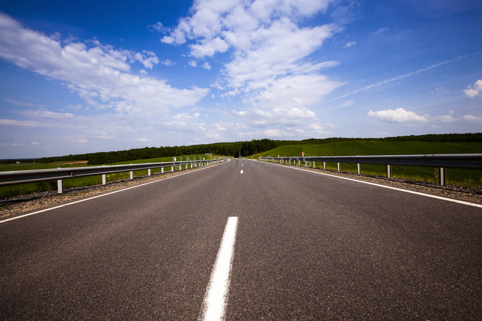  the road asphalted. summertime of year. Belarus