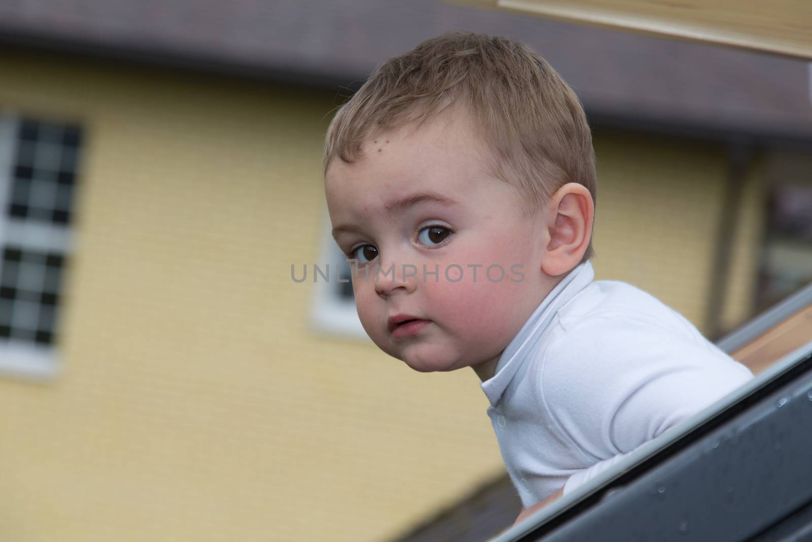 pretty little baby boy in window by desant7474