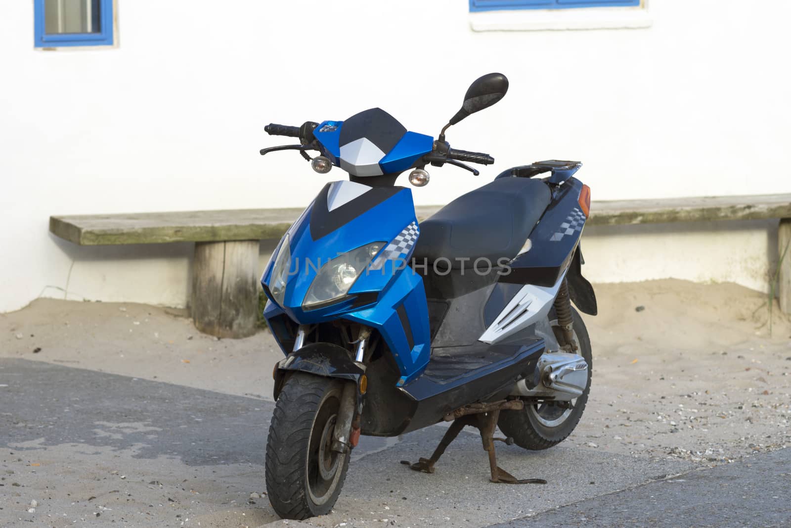 Black and blue scooter parked outdoors in denmark