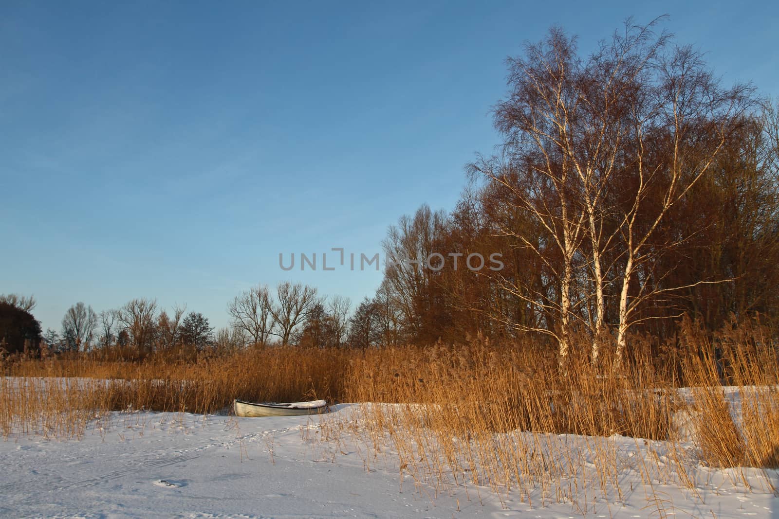 Boats at the lake in winter in Denmark