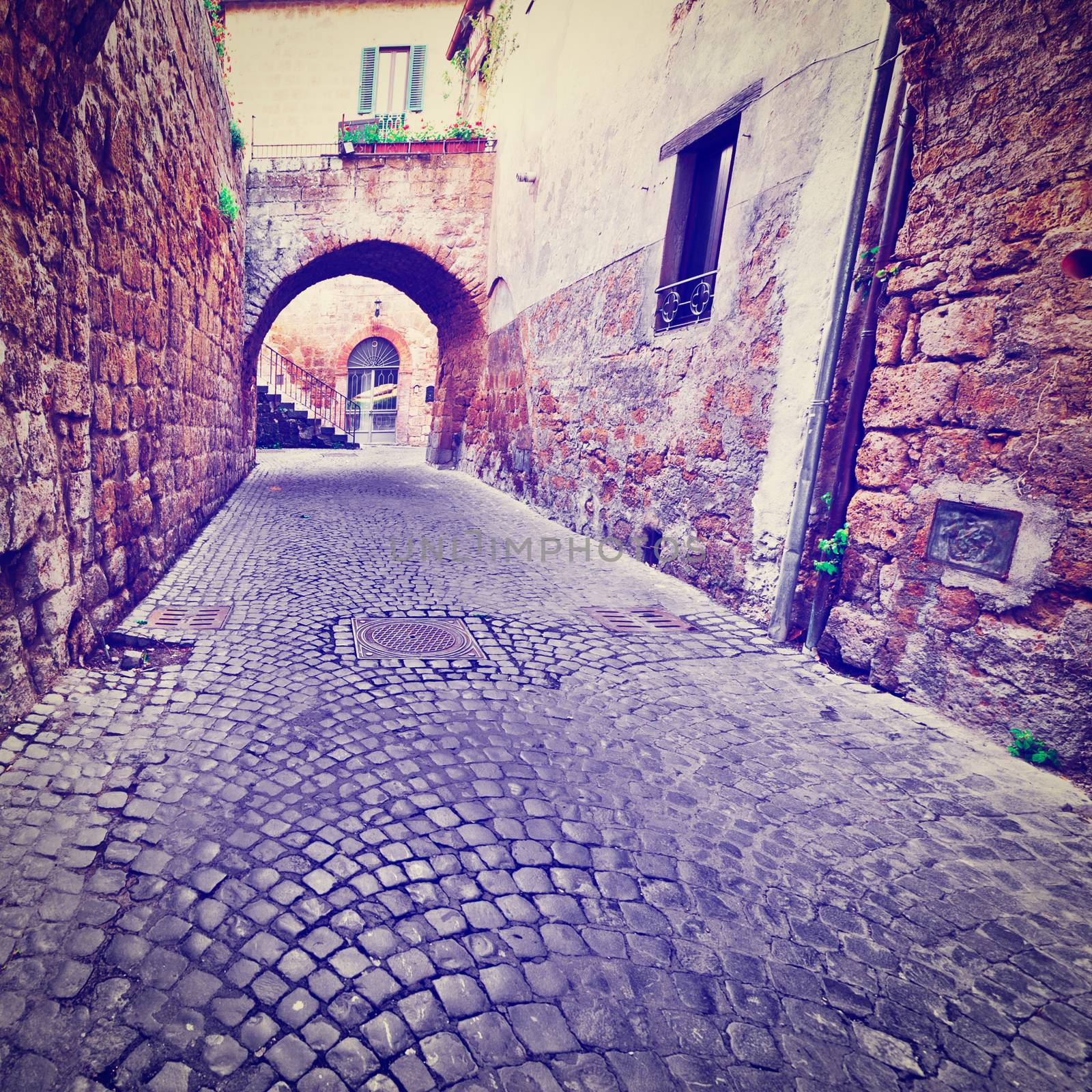 Narrow Street with an Arch in the Medieval Italian City, Instagram Effect