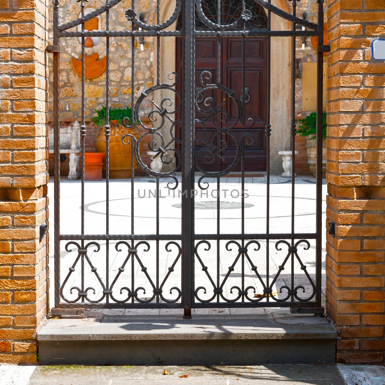 Steel Gate  Leading into the Courtyard of Old Italian House