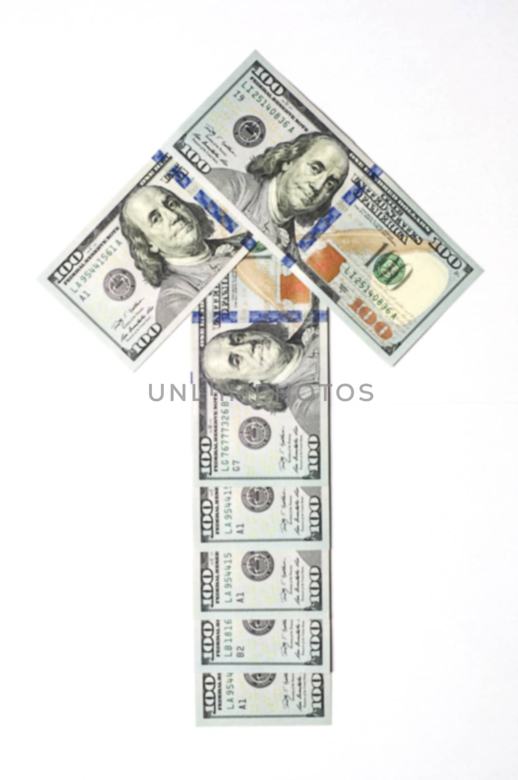 Arrow made of dollar bills by dred