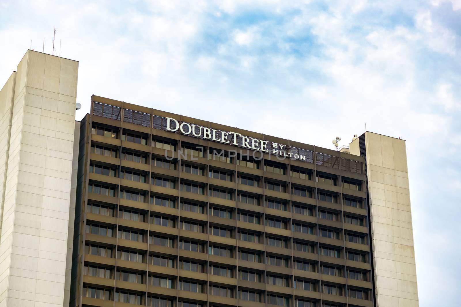 BLOOMINGTON, MN/USA - August 13, 2015: Double Tree by Hilton hotel exterior. Hilton is an international chain of full service hotels and resorts and the flagship brand of Hilton Worldwide.