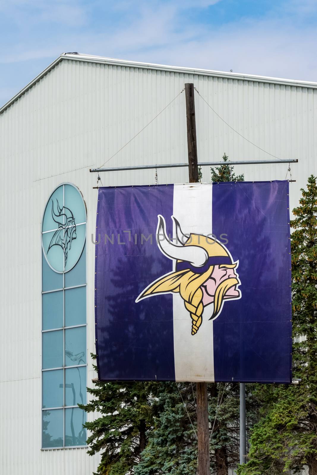 EDEN PRAIRIE, MN/USA - August 13, 2015: Minnesota Vikings practice facility and flag. The Minnesota Vikings are a professional American football team based in Minneapolis, Minnesota.