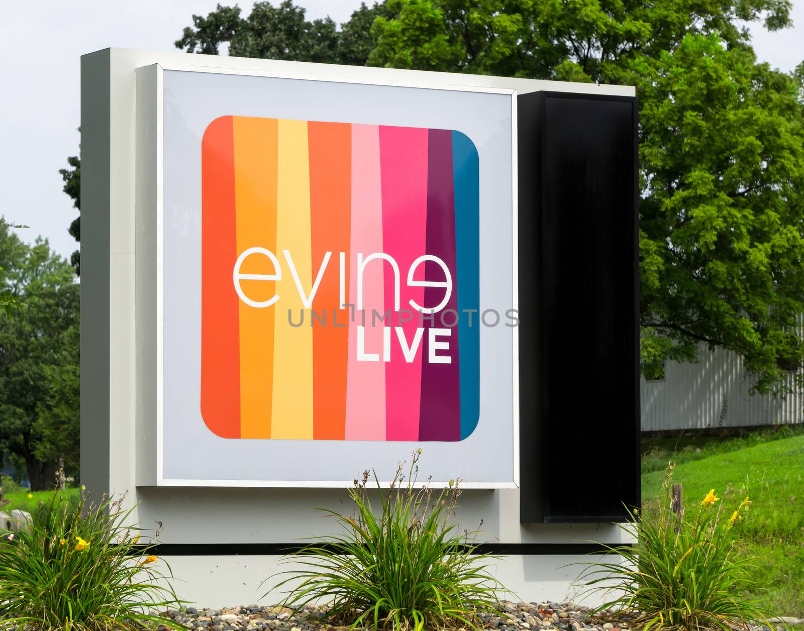 EDEN PRAIRIE, MN/USA - August 13, 2015: Evine Live corporate headquarters and sign. Evine Live is a cable, satellite and broadcast television shopping network.