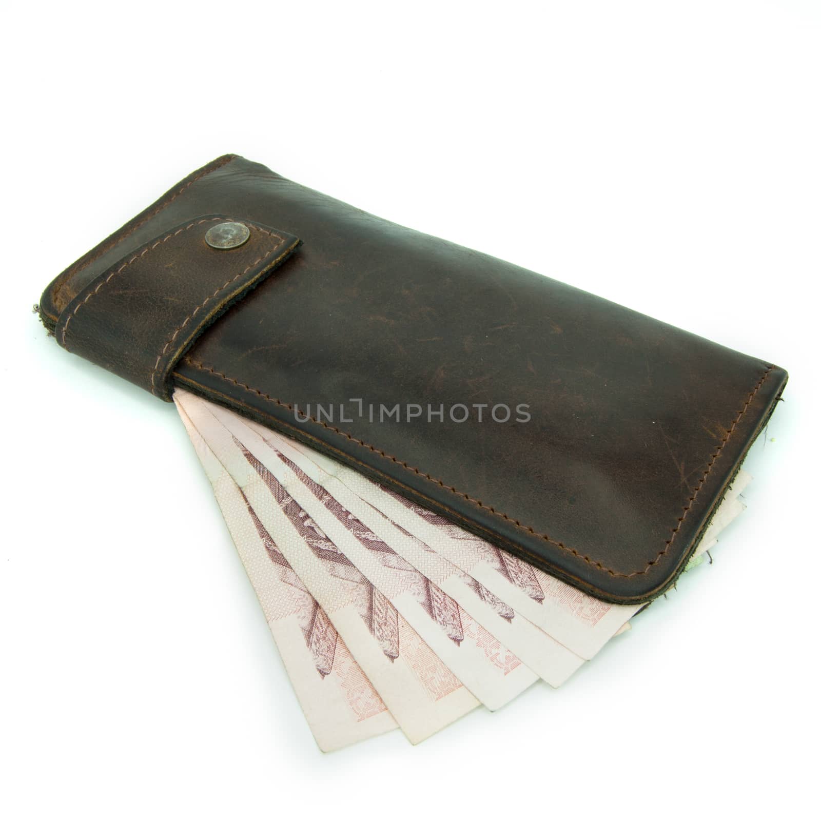 brown leather wallet with money isolated on white background by kritsada1992