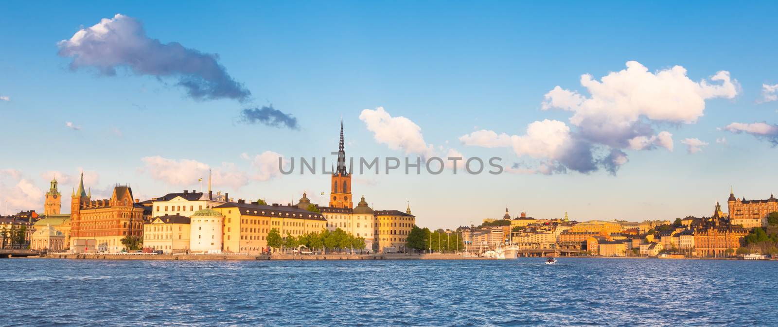 Panoramic view of swedish capital Stockholm in sunset. Gamla stan, old medieval downtown. Panoramic composition.