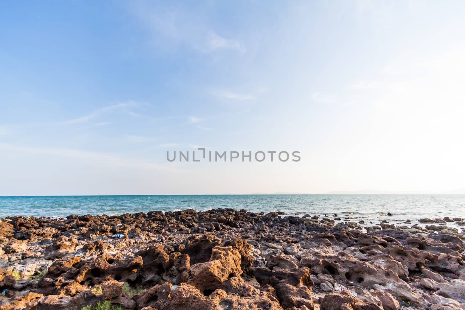 Rocks , sea and blue sky texture background