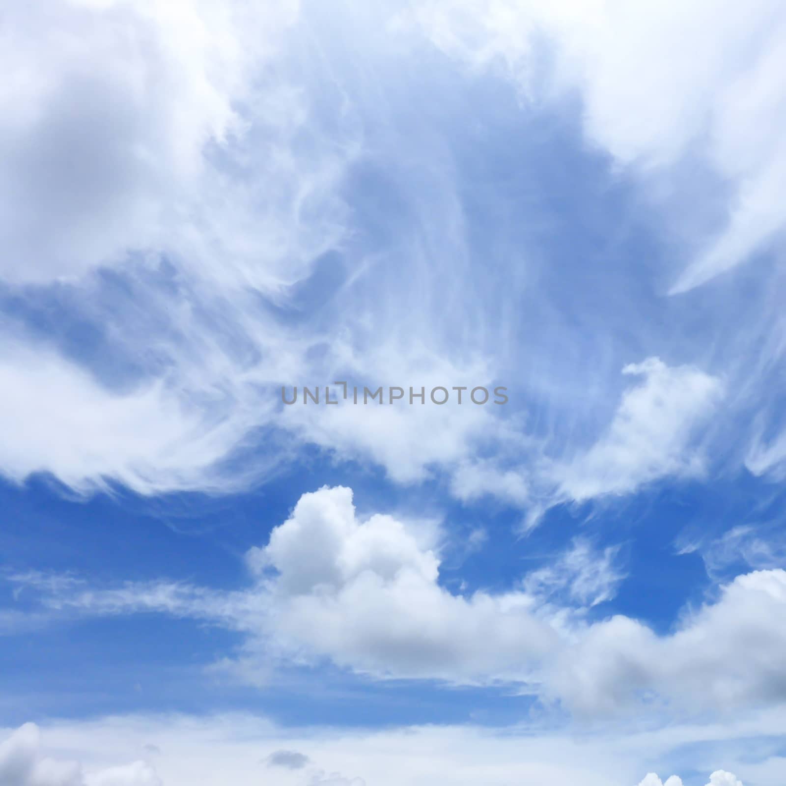 The soft clounds on bright blue sky background