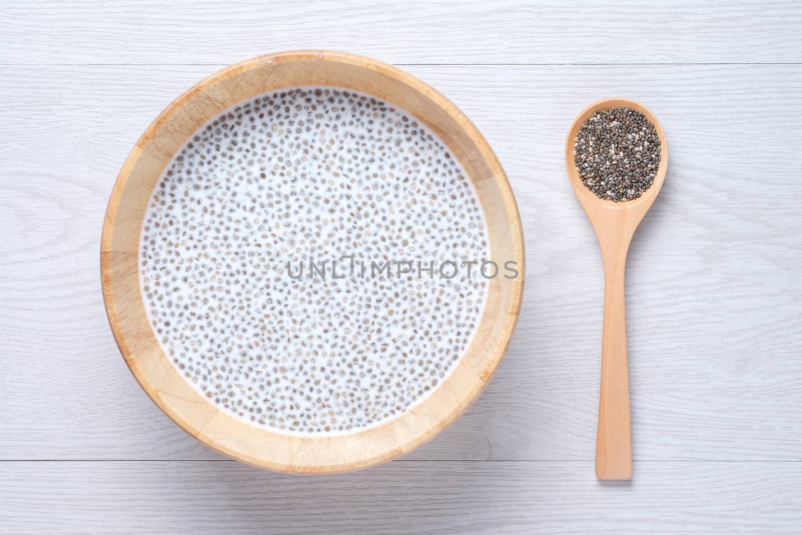 chai seed with milk on the white wooden table