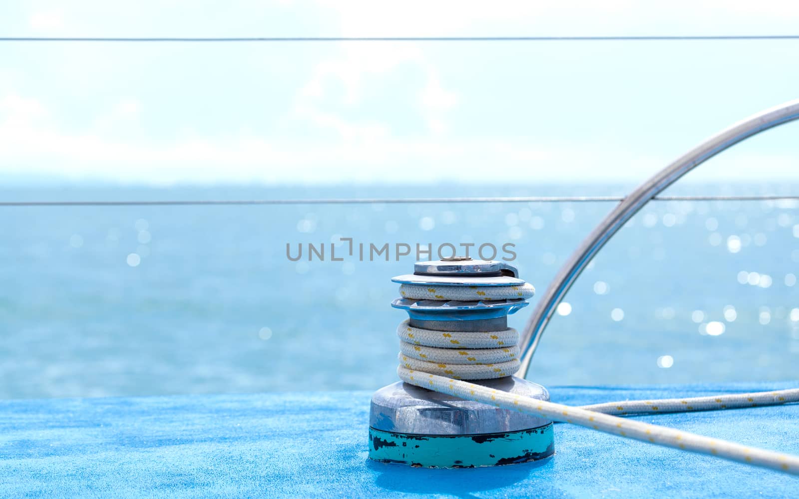 Sailboat winch and rope yacht detail with selective focus.