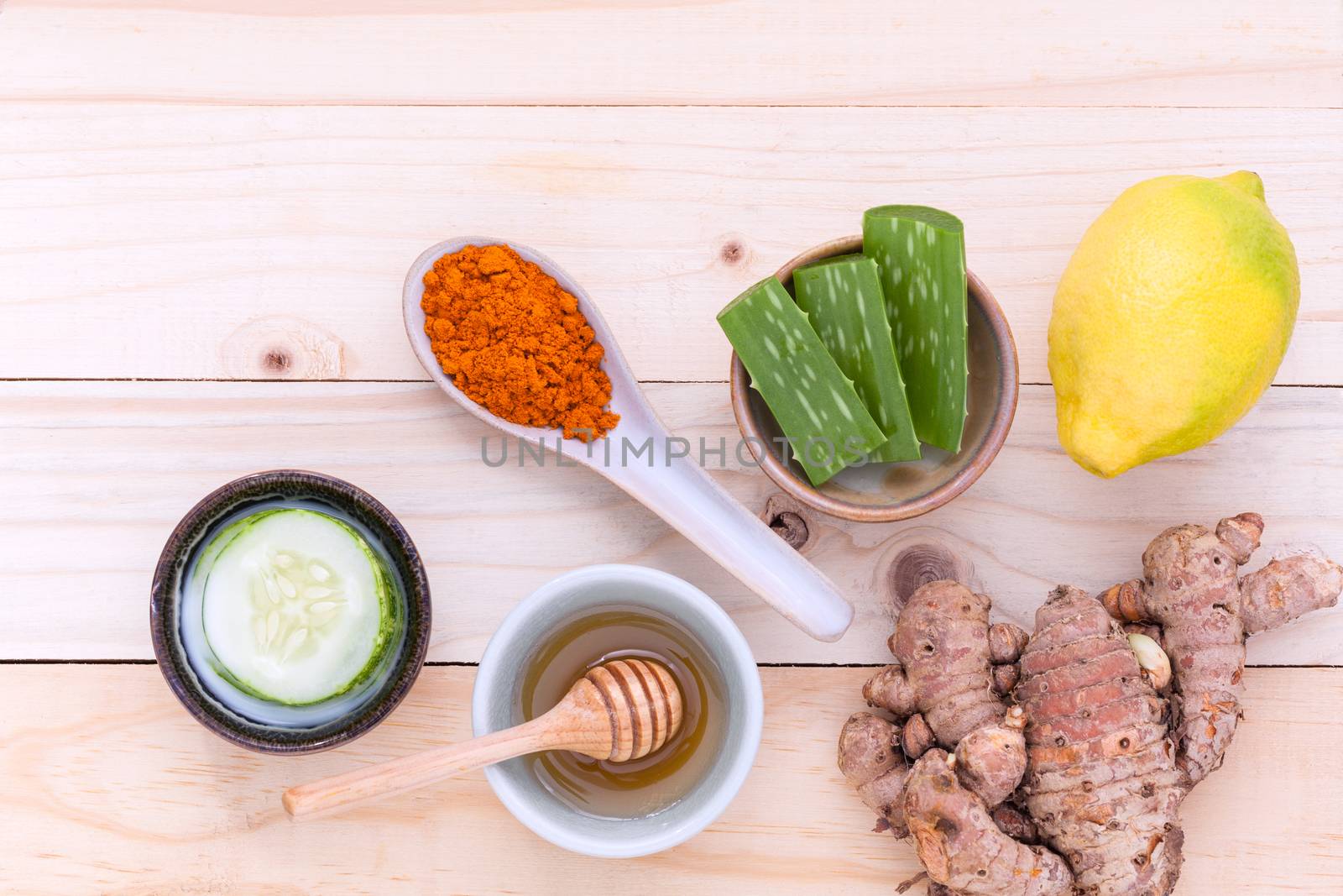 Natural Spa Ingredients homemade facial masks and natural ingredients for skin care on wooden table. by kerdkanno