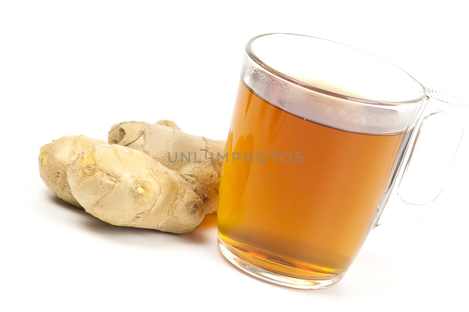 Cup of black tea served with ginger isolated on white