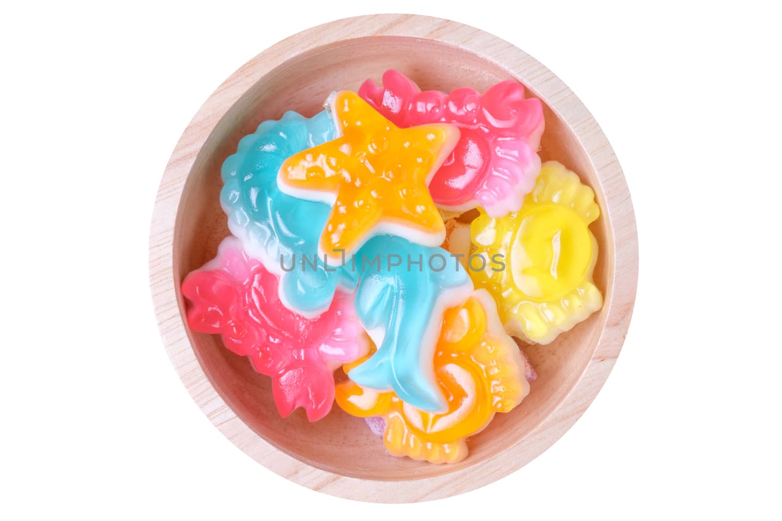 Colorful jelly in wooden bowl , isolate white background.