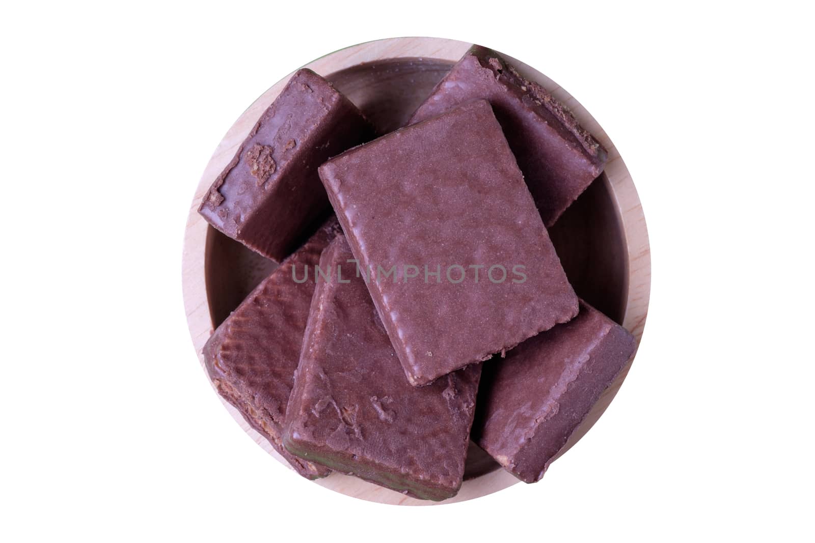 chocolate wafer in wooden bowl, isolate white background.