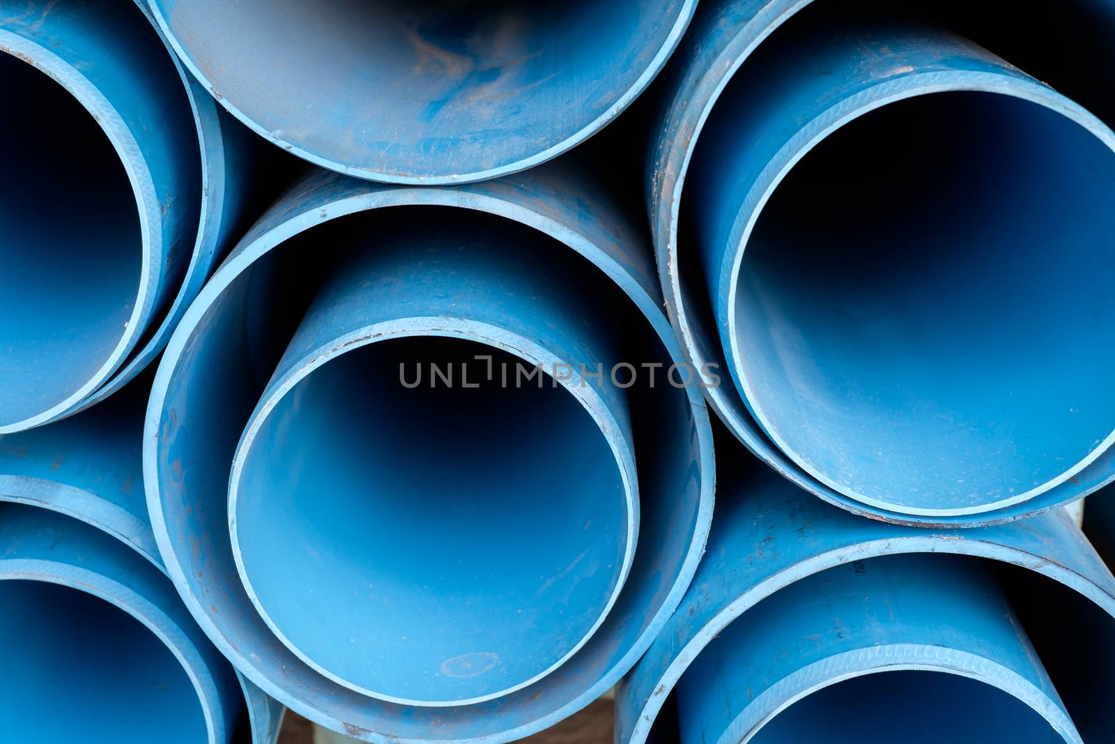 Closeup dusty of blue pipe pvc in stock