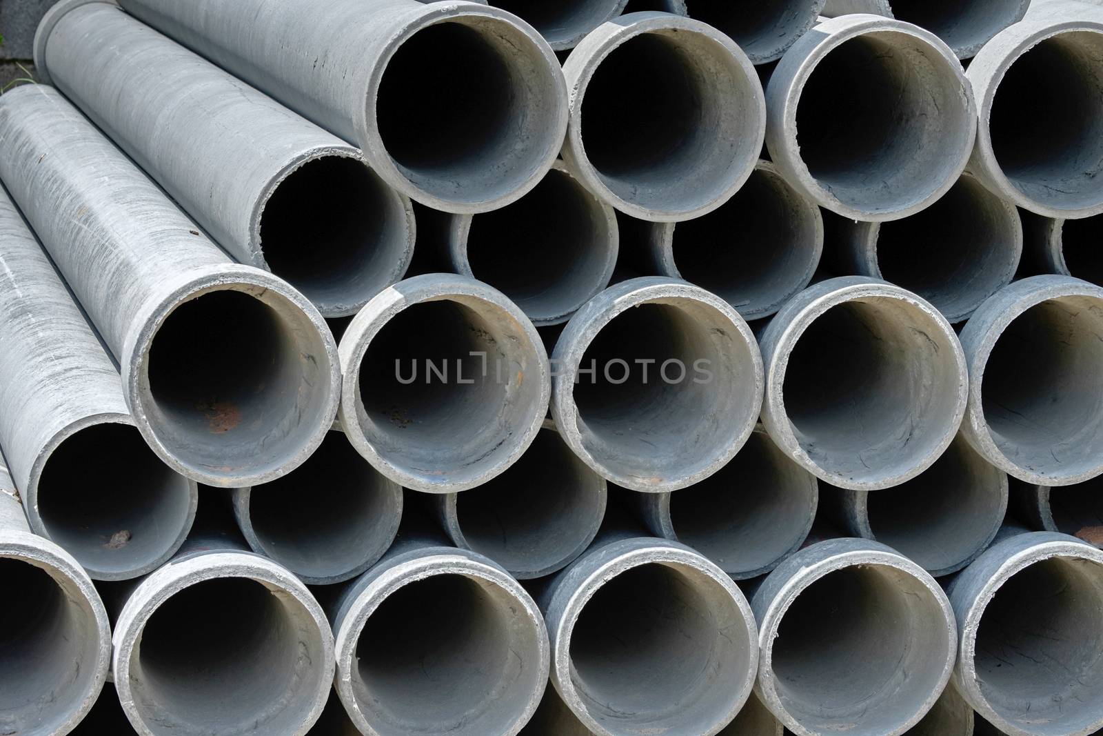 Arrange cement pipe in stock warehouse
