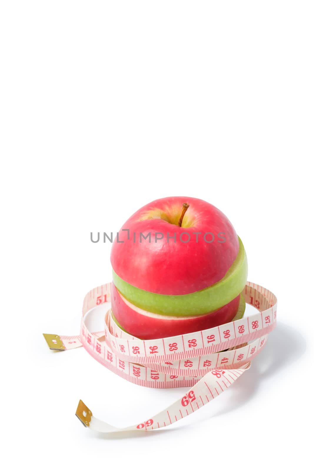 slice red and green apples with waist measure on white background.space for adding your text.

