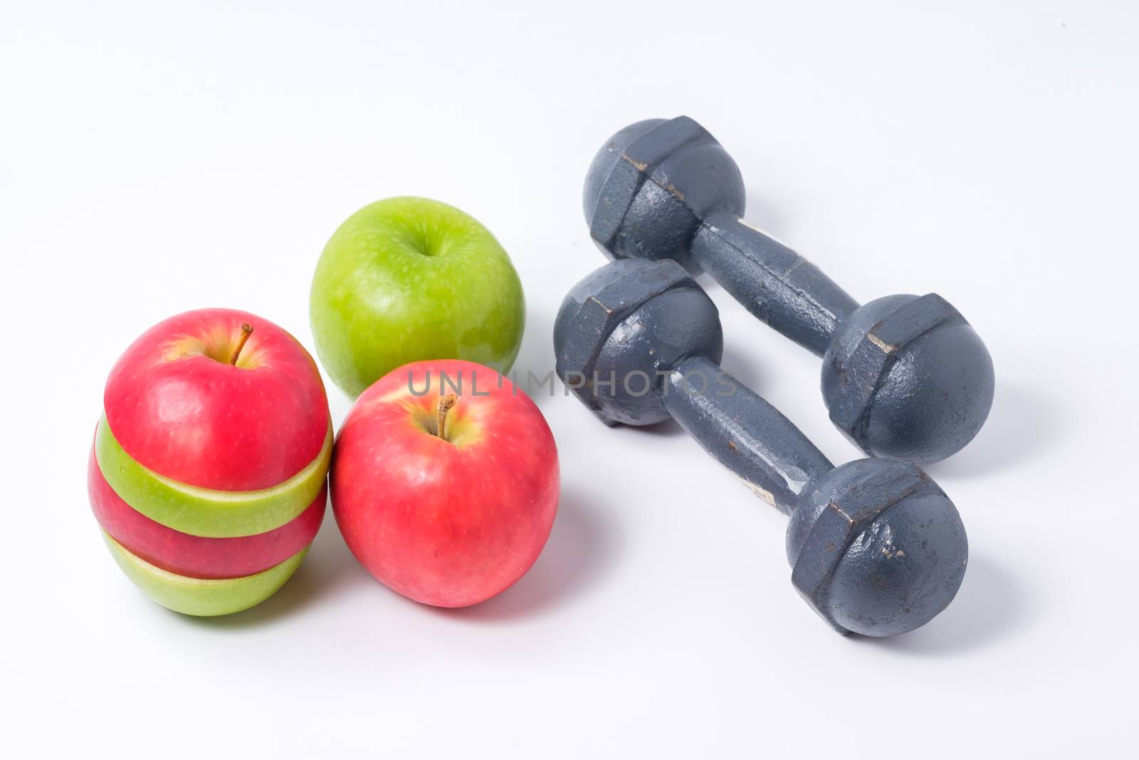 slice red and green apples with dumbbell by zneb076